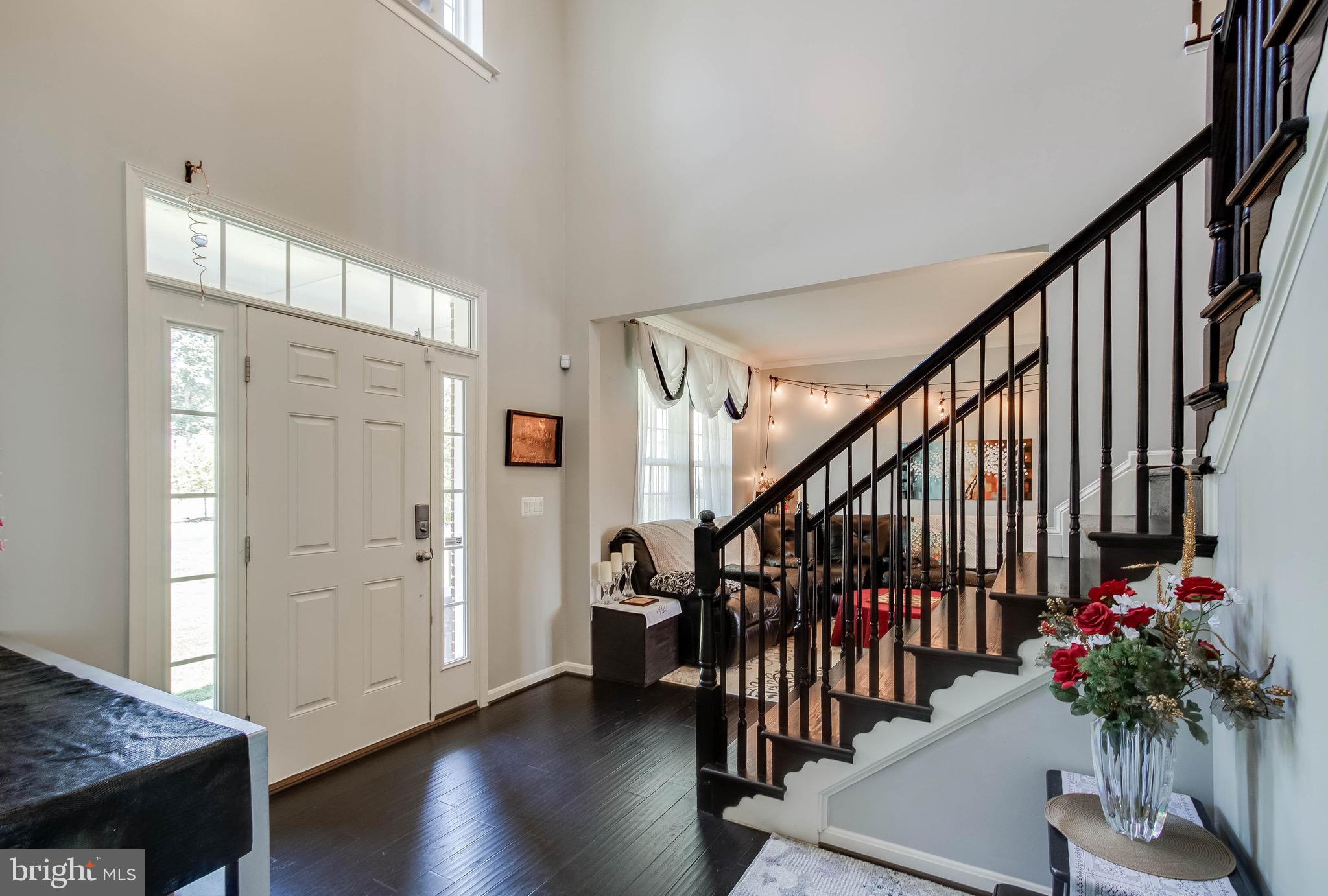 5952 Hunter Crest Road Woodbridge, VA 22193 - Photo 18 of 44 Center Hallway with hardwood flooring