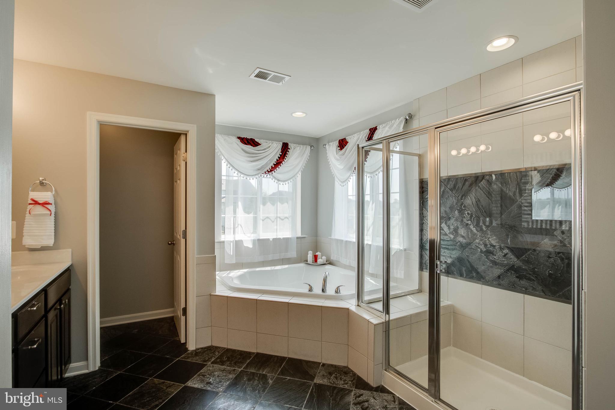 5952 Hunter Crest Road Woodbridge, VA 22193 - Photo 24 of 44 Master Bathroom with soaking tub and shower