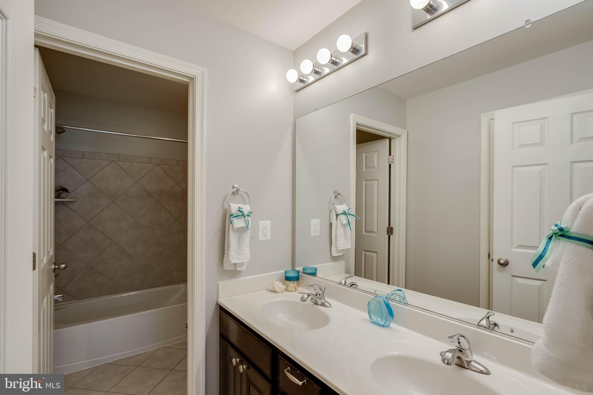 5952 Hunter Crest Road Woodbridge, VA 22193 - Photo 30 of 44 Upstairs Hallway Bathroom with double sink