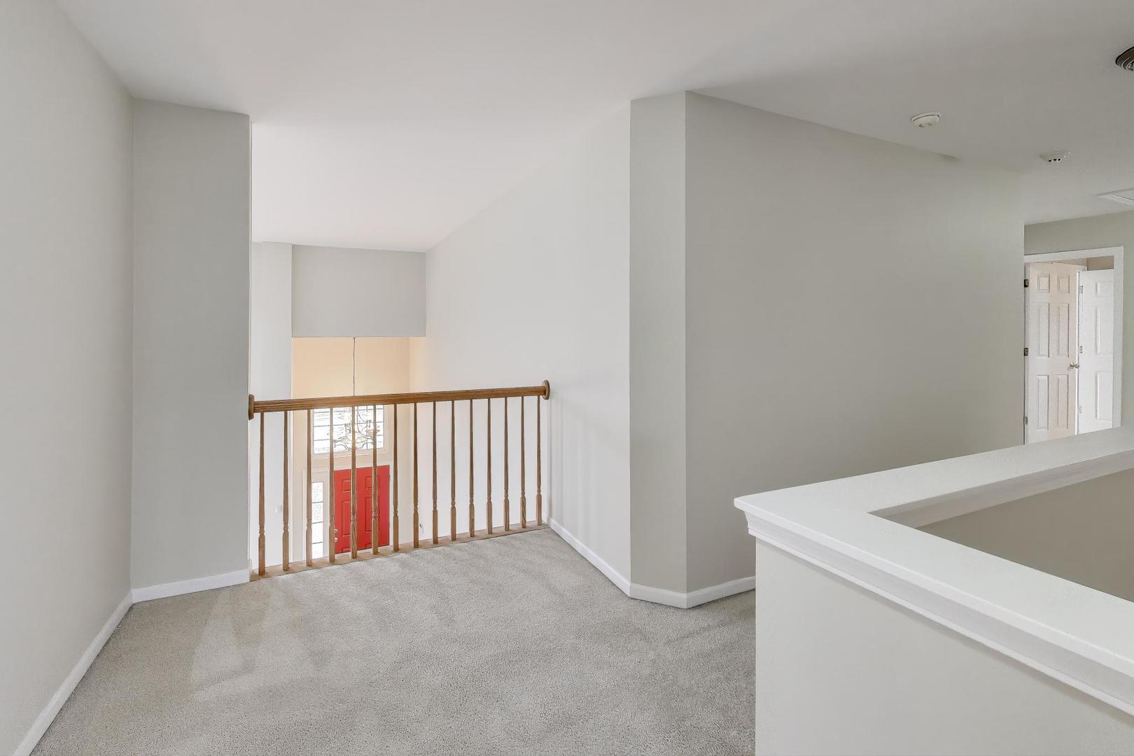 9699 Fairfield Road Huntley, IL 60142 - Photo 24 of 59 a view of a livingroom and an empty room