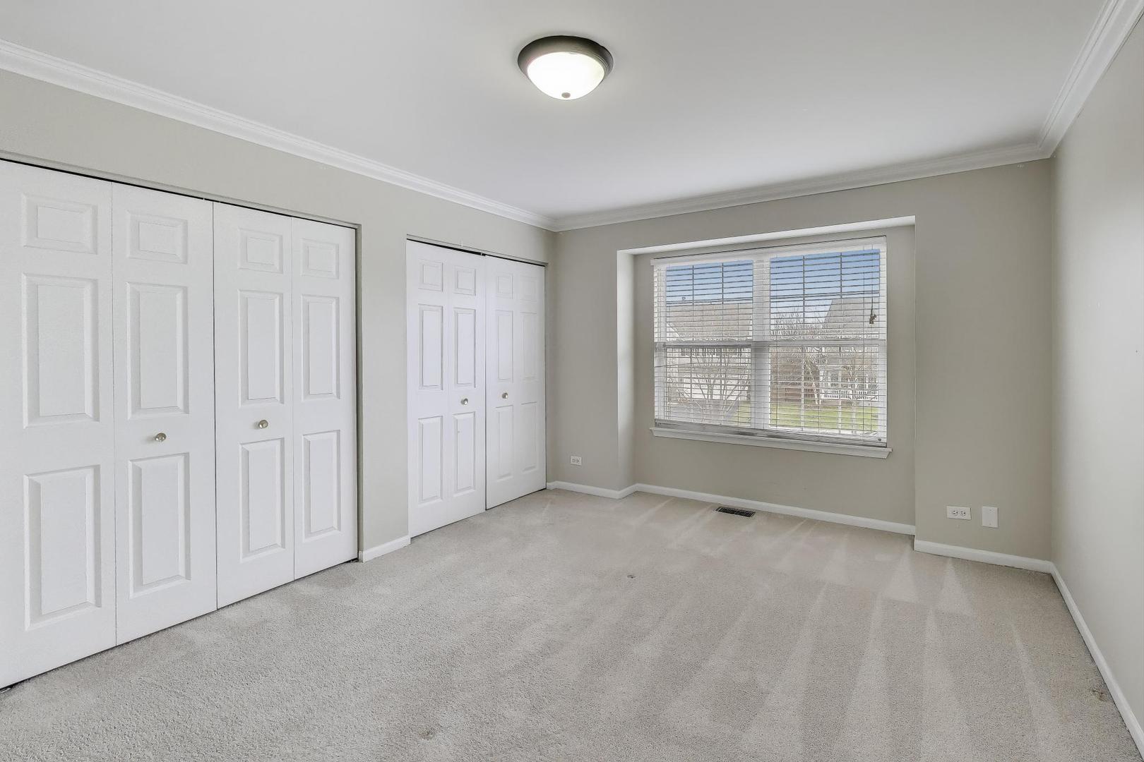 9699 Fairfield Road Huntley, IL 60142 - Photo 31 of 59 an empty room with windows