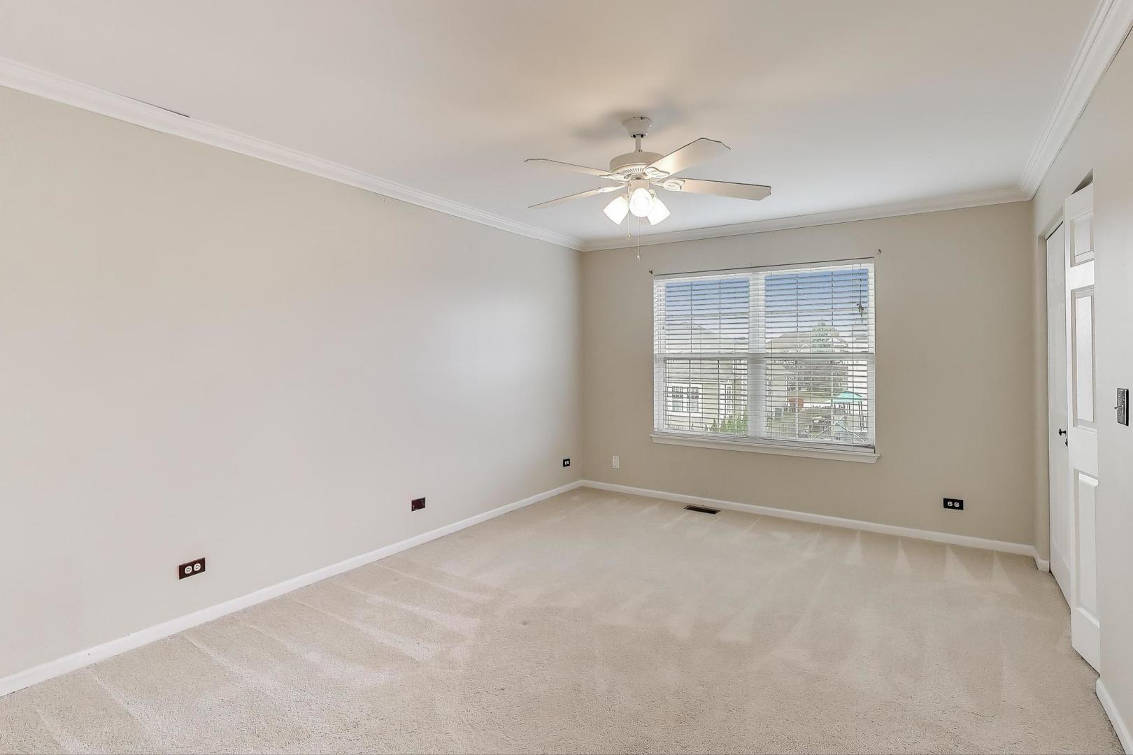 9699 Fairfield Road Huntley, IL 60142 - Photo 33 of 59 a view of an empty room with a window