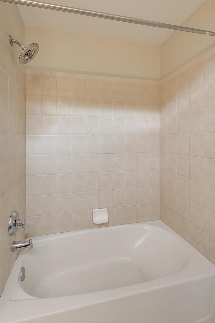 9699 Fairfield Road Huntley, IL 60142 - Photo 36 of 59 a bathroom with a bathtub