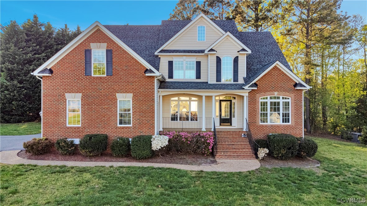5000 Faraday Drive Chester, VA 23831 - Photo 1 of 40 front view of a house with a yard