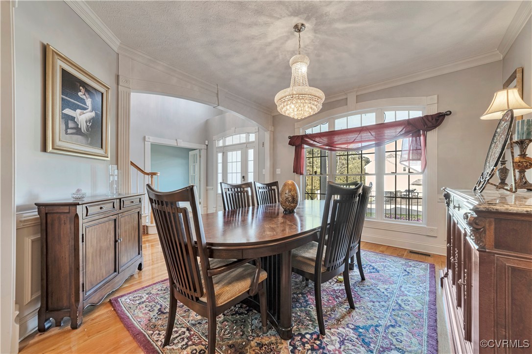 5000 Faraday Drive Chester, VA 23831 - Photo 11 of 40 a view of a dining room with furniture window and wooden floor