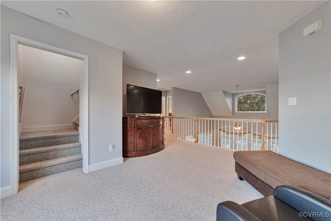 5000 Faraday Drive Chester, VA 23831 - Photo 32 of 40 a living room with furniture and a flat screen tv