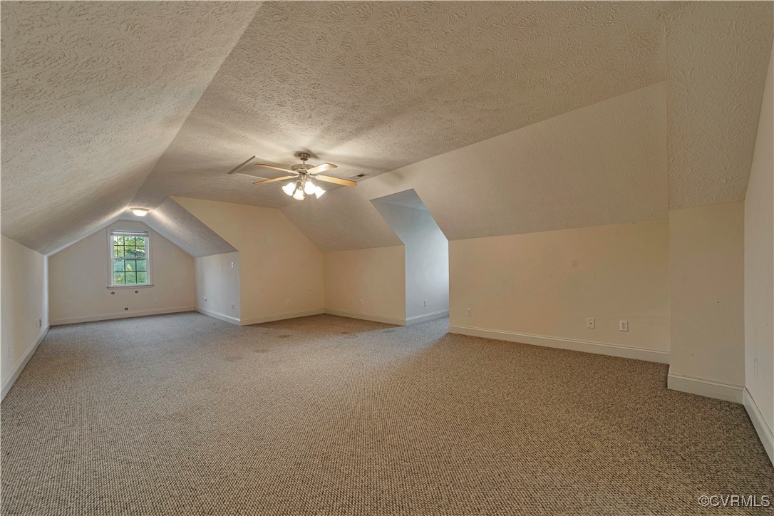 5000 Faraday Drive Chester, VA 23831 - Photo 38 of 40 a view of a livingroom with a ceiling fan and window