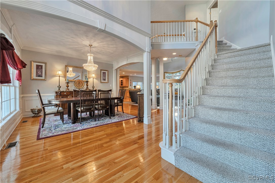 5000 Faraday Drive Chester, VA 23831 - Photo 8 of 40 a dining room with furniture entryway and wooden floor
