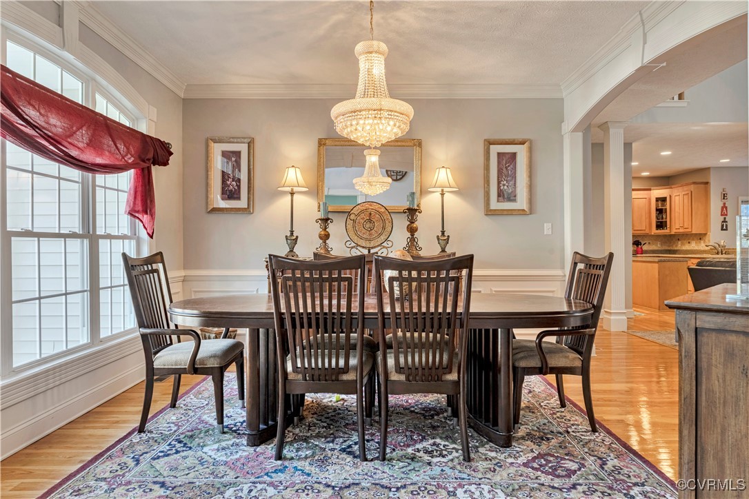 5000 Faraday Drive Chester, VA 23831 - Photo 10 of 40 a view of a dining room with furniture window and wooden floor