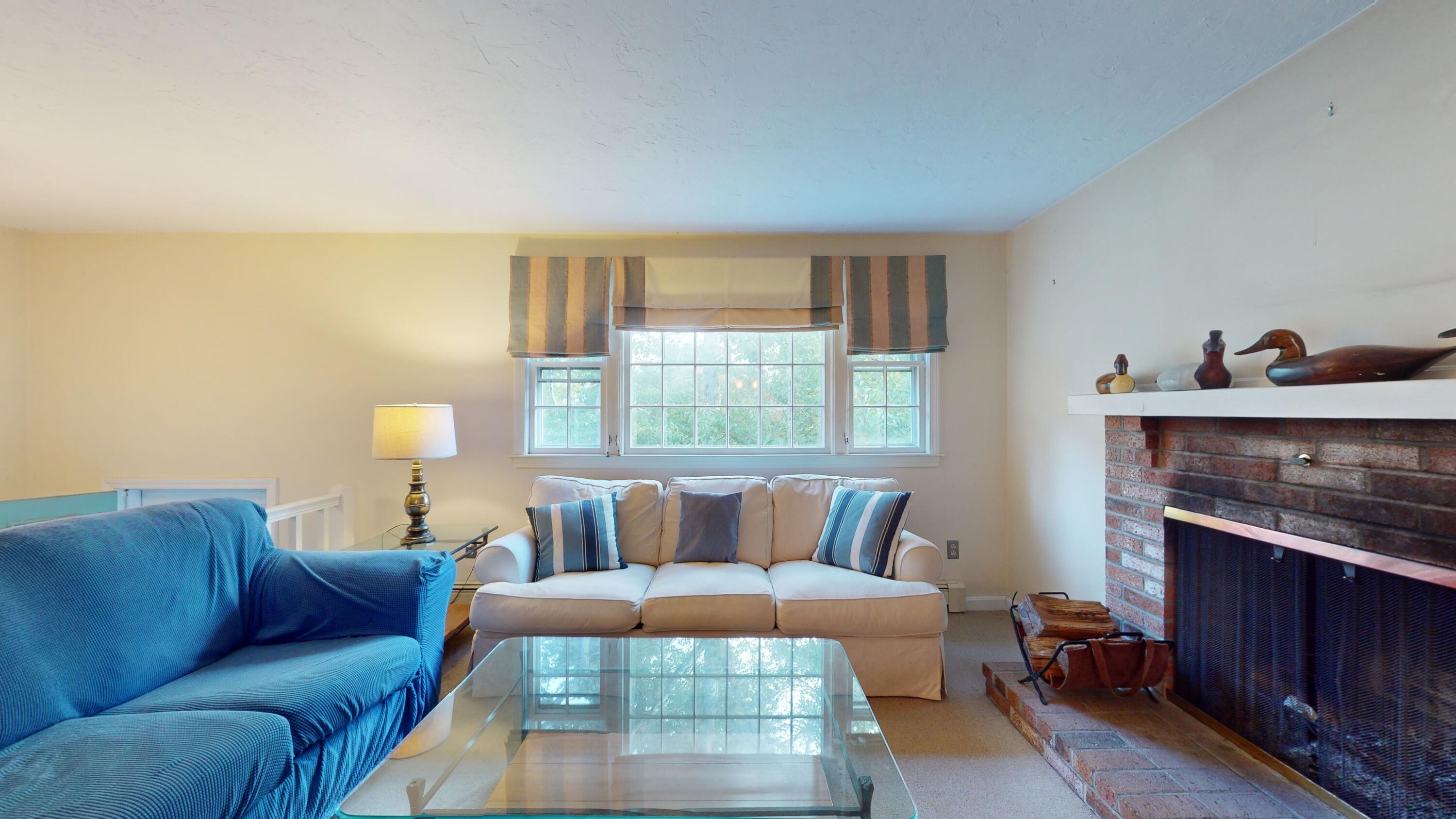 17 Toms Path Dennis Port, MA 02639 - Photo 12 of 31 a bedroom with a bed and wooden floor