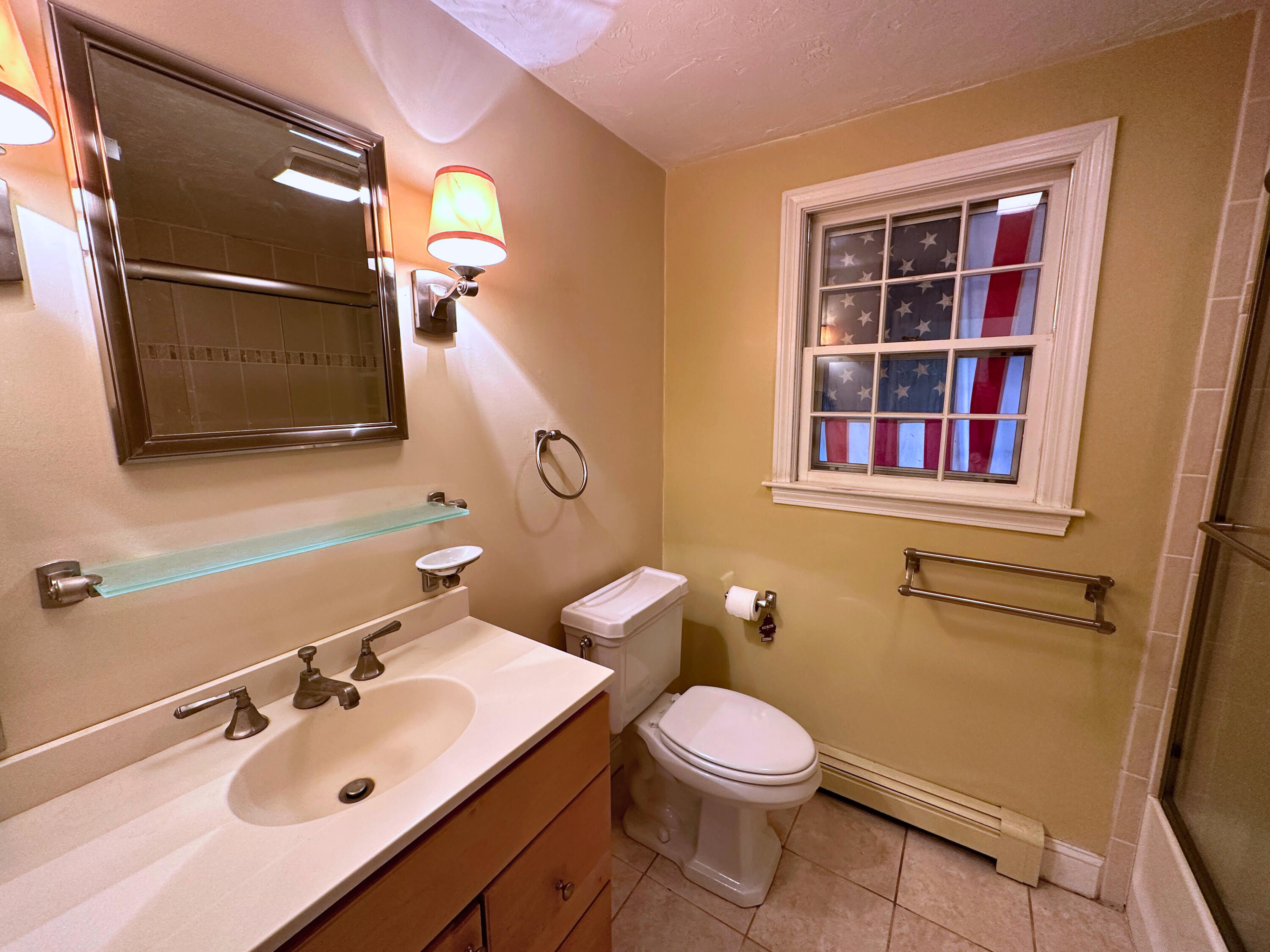 17 Toms Path Dennis Port, MA 02639 - Photo 15 of 31 a bathroom with a sink mirror and toilet