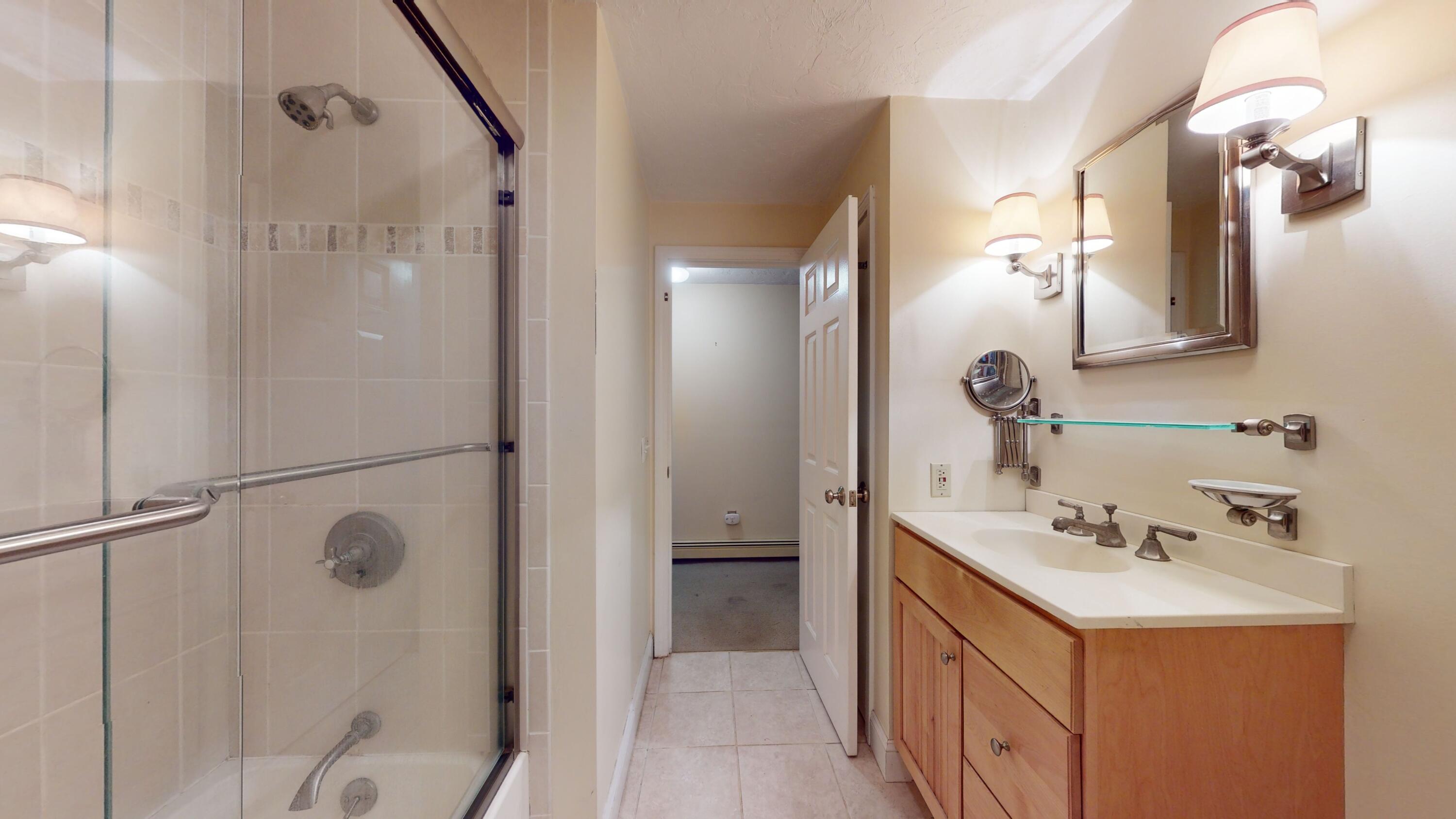 17 Toms Path Dennis Port, MA 02639 - Photo 16 of 31 a bathroom with a sink vanity and a mirror