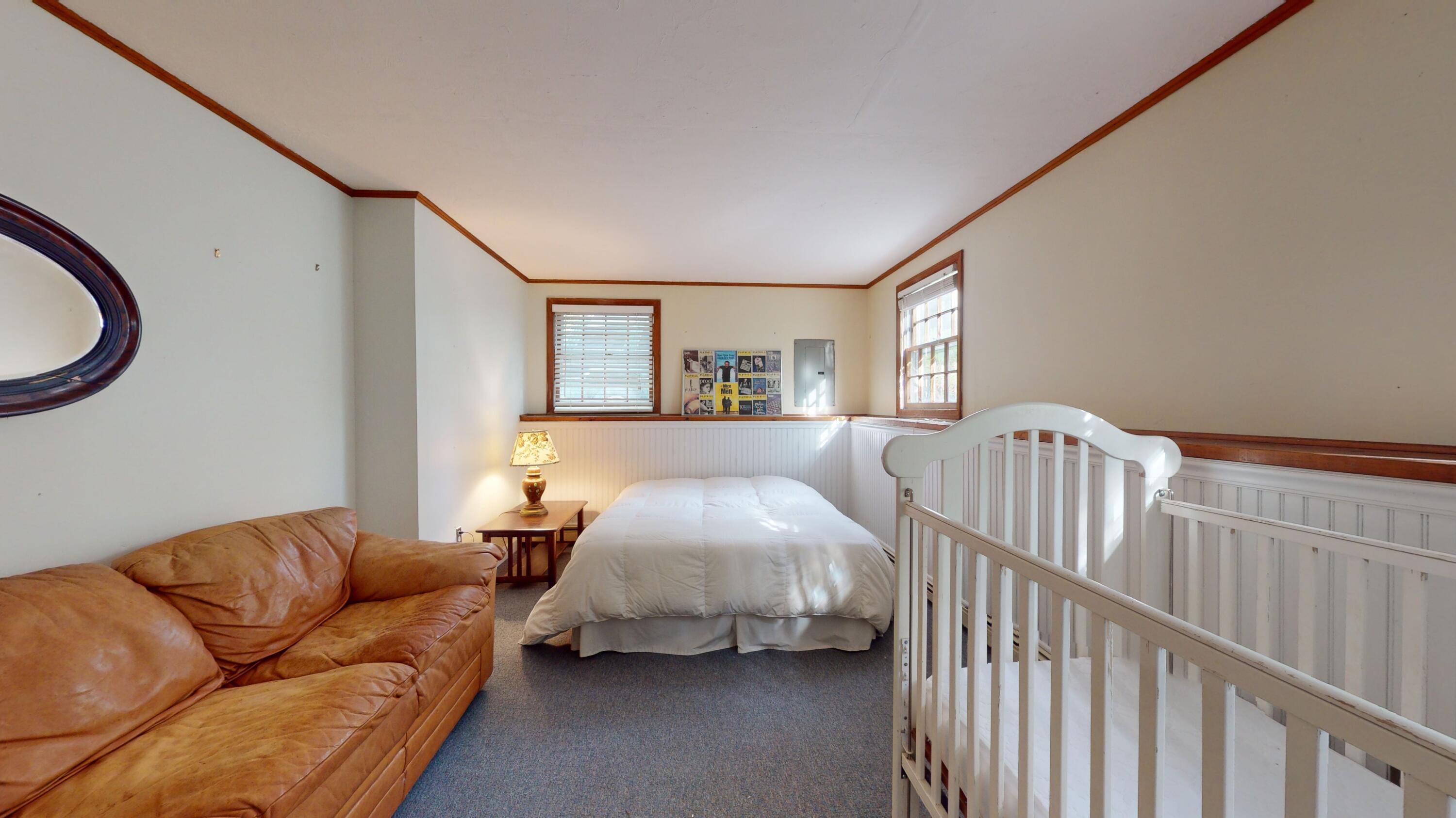 17 Toms Path Dennis Port, MA 02639 - Photo 18 of 31 a bedroom with furniture and a window
