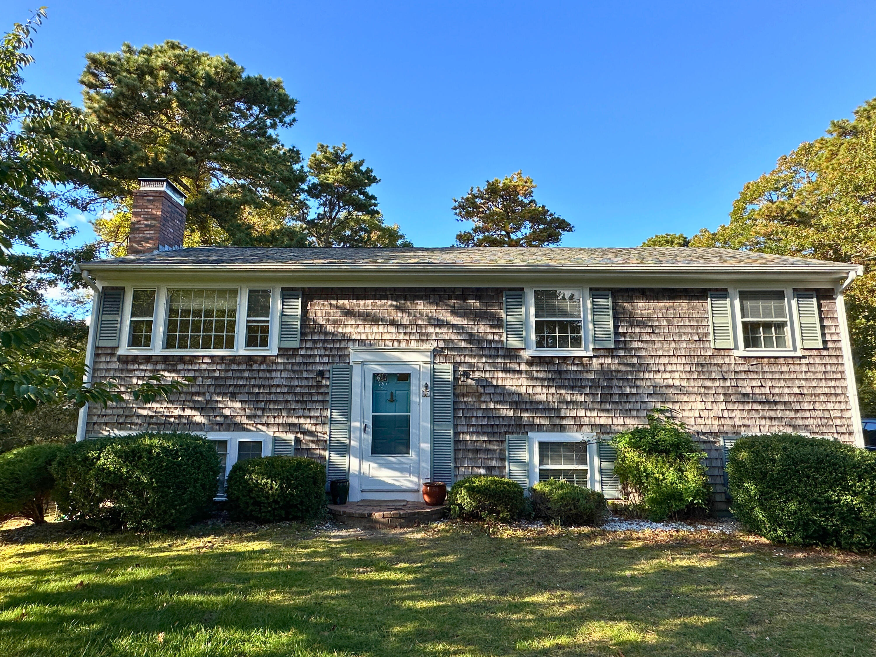 17 Toms Path Dennis Port, MA 02639 - Photo 26 of 31 a view of a house with a garden and plants