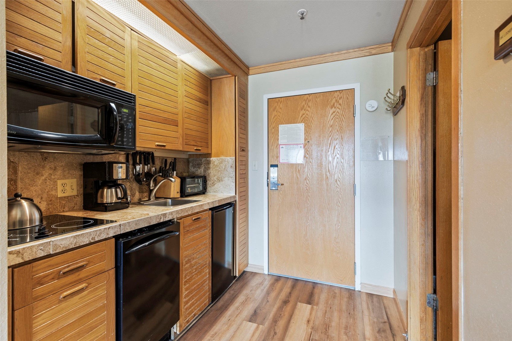 1211 West Keystone Road, Unit 2736 Keystone, CO 80435 - Photo 13 of 35 a kitchen with stainless steel appliances granite countertop a refrigerator and a sink