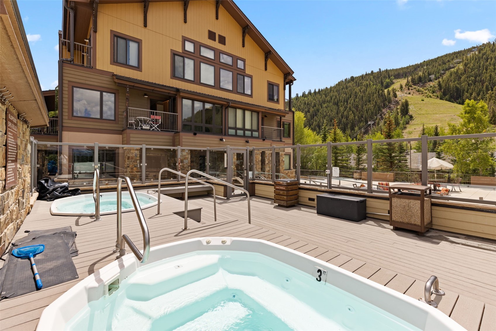 1211 West Keystone Road, Unit 2736 Keystone, CO 80435 - Photo 27 of 35 a view of a swimming pool with a lounge chairs