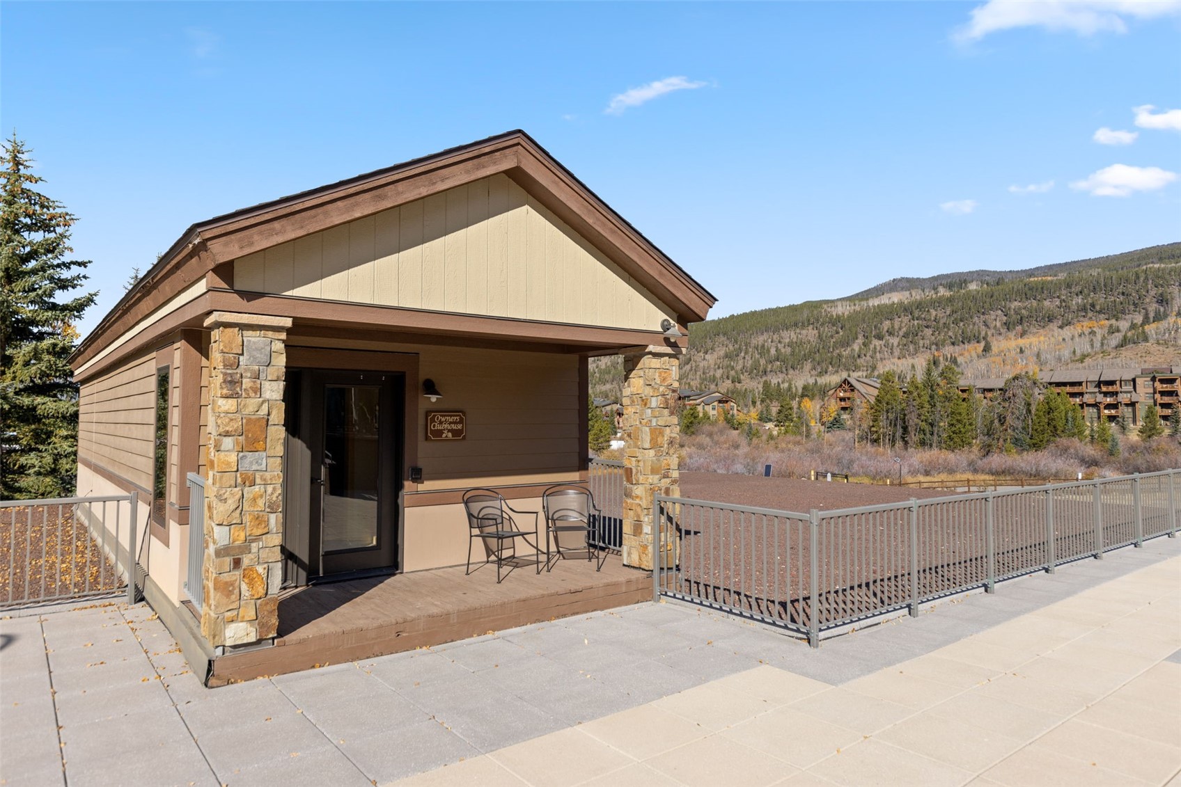 1211 West Keystone Road, Unit 2736 Keystone, CO 80435 - Photo 29 of 35 a view of a small house with wooden fence