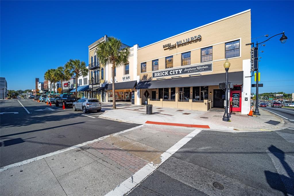 742 Southeast 12th Street Ocala, FL 34471 - Photo 39 of 44 a building with sign board in front of it