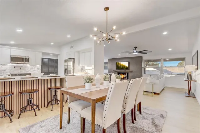 a view of a livingroom with furniture and a table