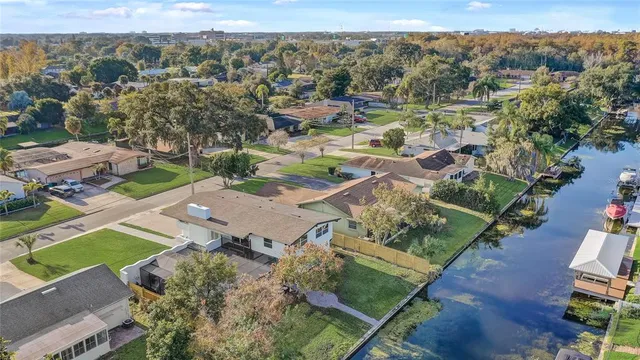 an aerial view of a house with a garden