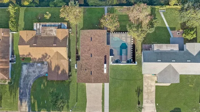 a view of a backyard with a patio