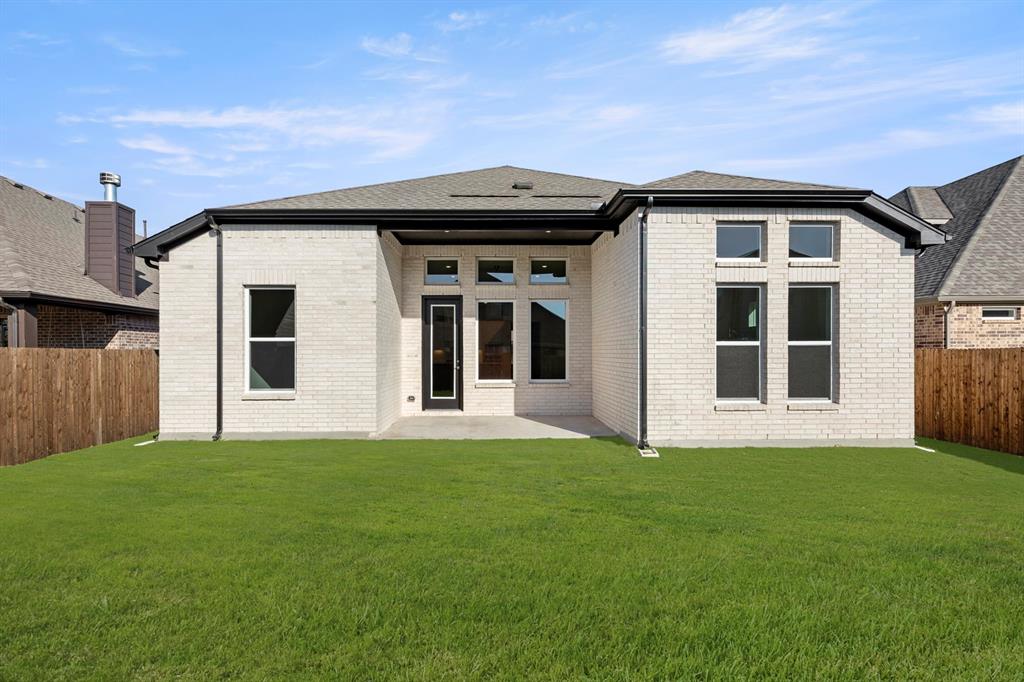 1201 Century Tree Lane Anna, TX 75409 - Photo 25 of 26 a front view of a house with a yard