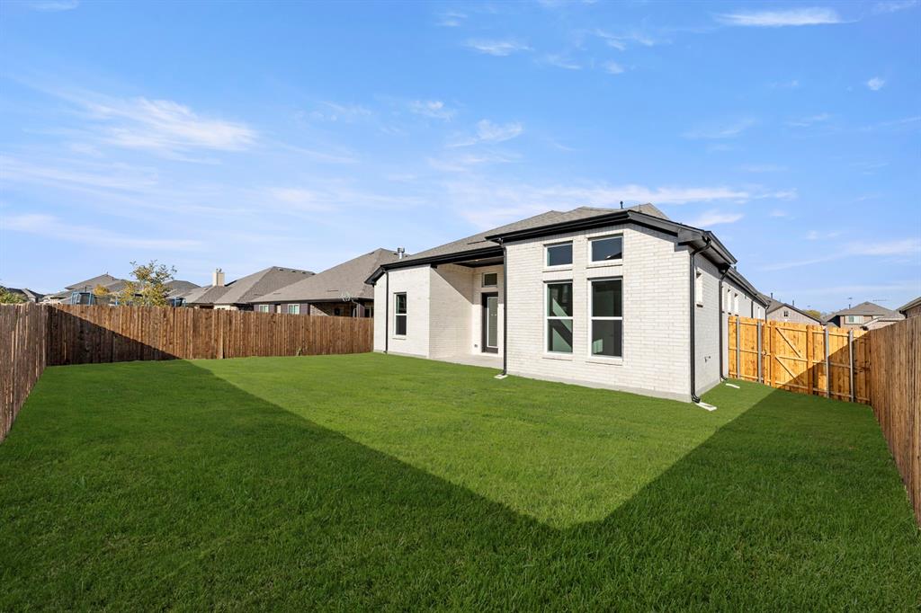 1201 Century Tree Lane Anna, TX 75409 - Photo 26 of 26 a front view of a house with a yard