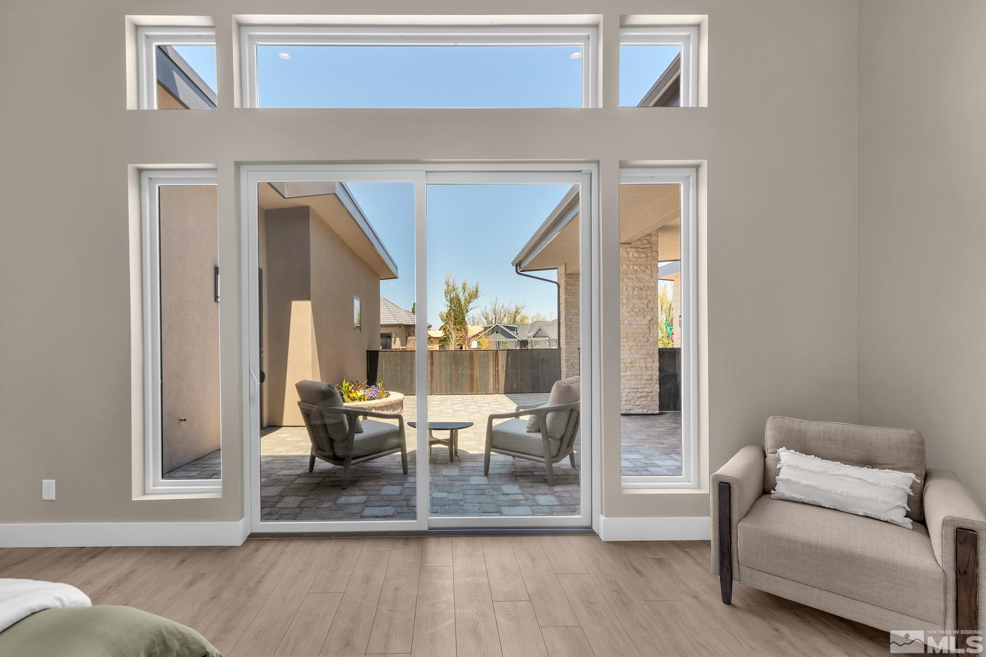 724 Canter Way Reno, NV 89511 - Photo 25 of 40 a living room with furniture and a window