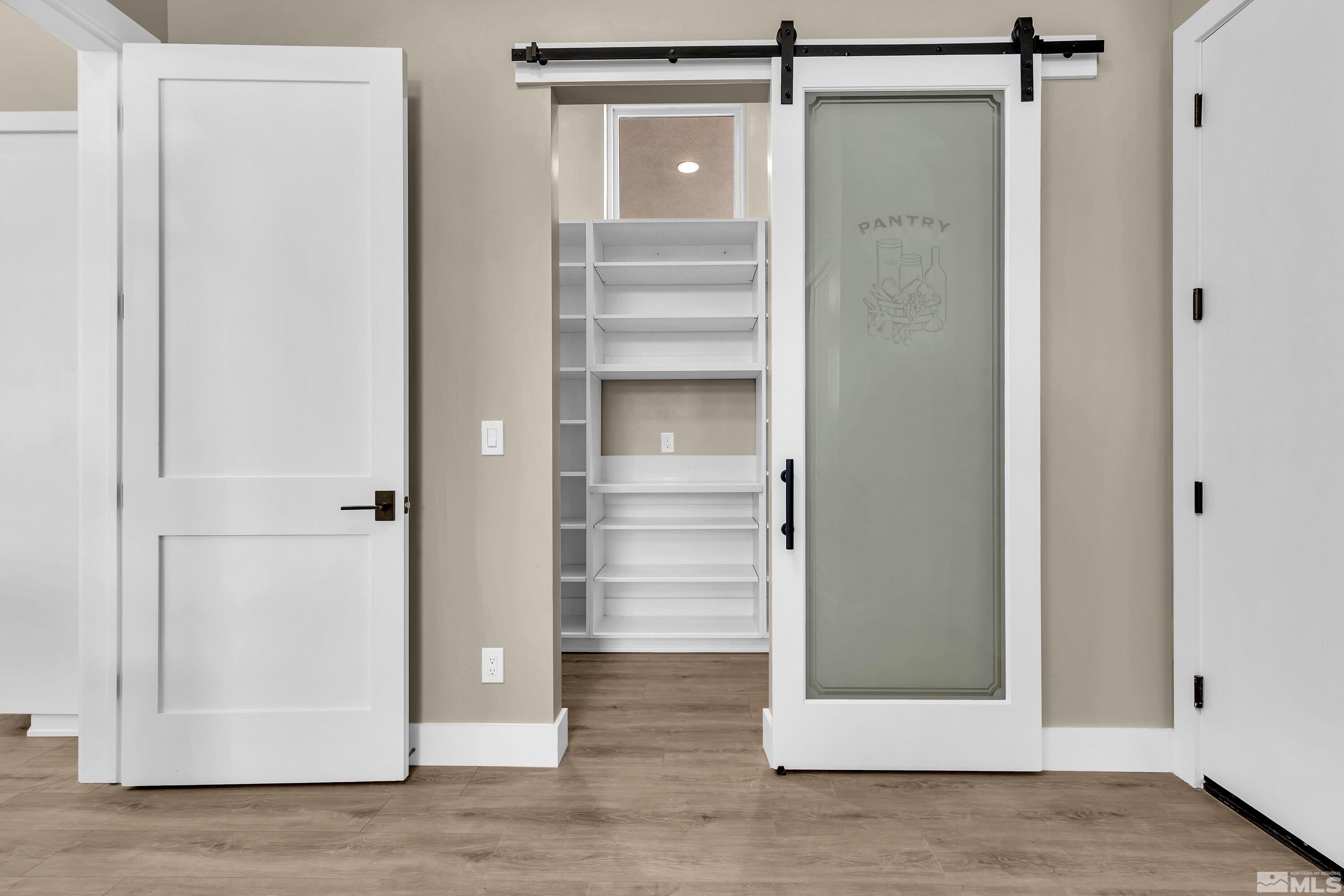 724 Canter Way Reno, NV 89511 - Photo 31 of 40 a view of walk in closet with empty racks