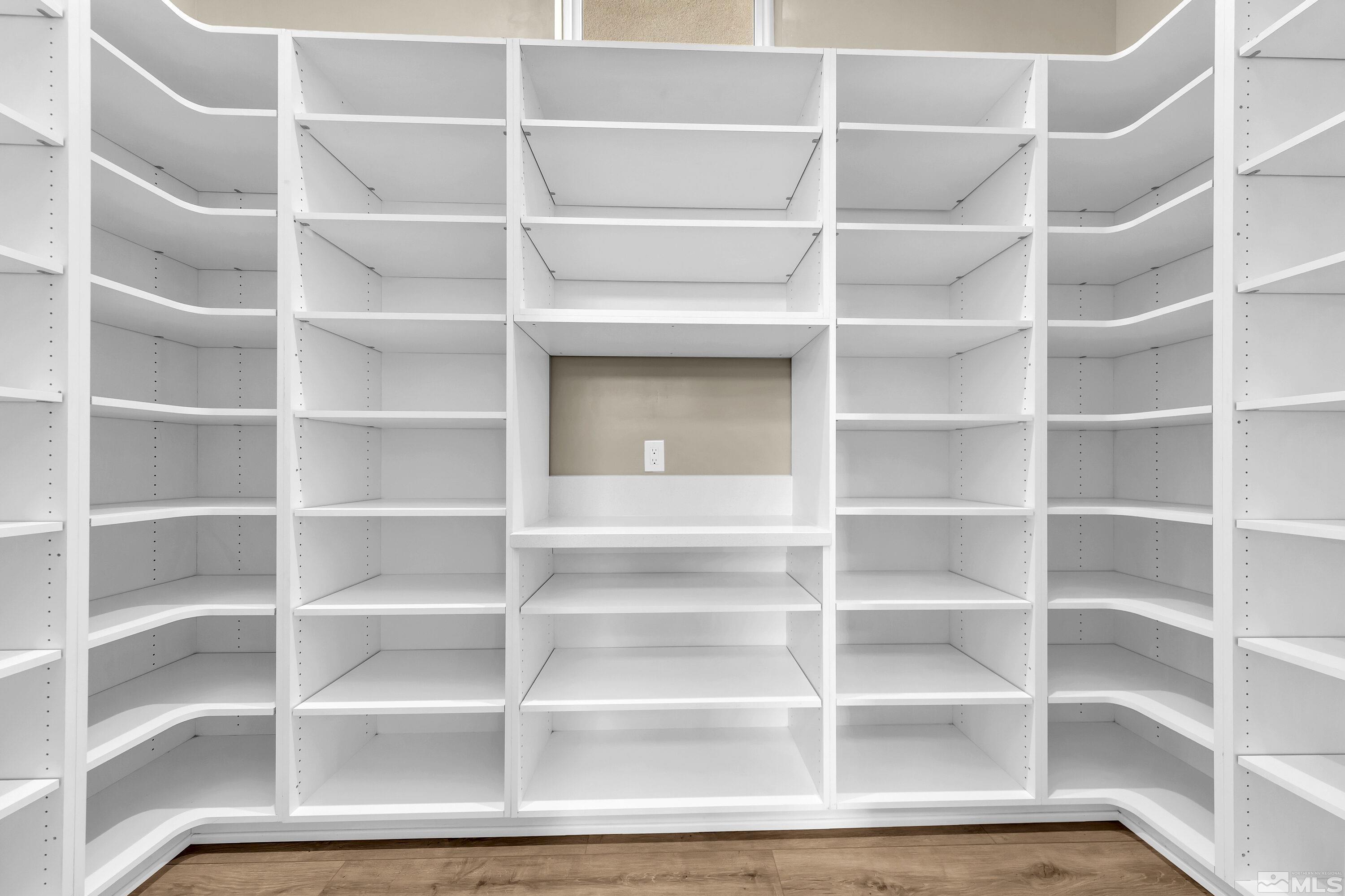 724 Canter Way Reno, NV 89511 - Photo 32 of 40 a view of an empty room with empty empty shelves