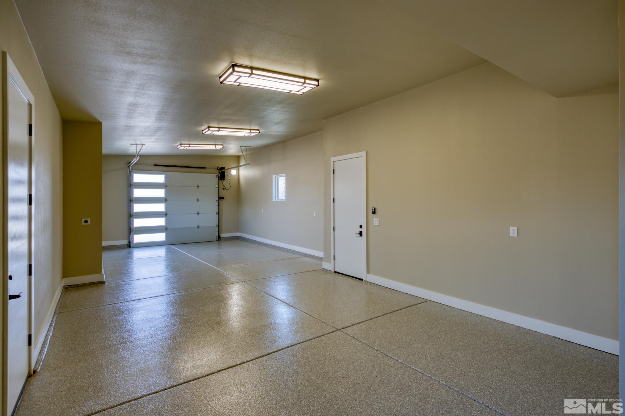 724 Canter Way Reno, NV 89511 - Photo 34 of 40 a view of a hallway with wooden floor