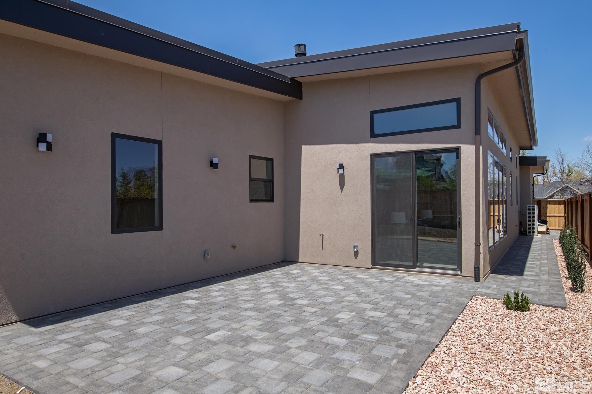724 Canter Way Reno, NV 89511 - Photo 35 of 40 a view of a house with a yard