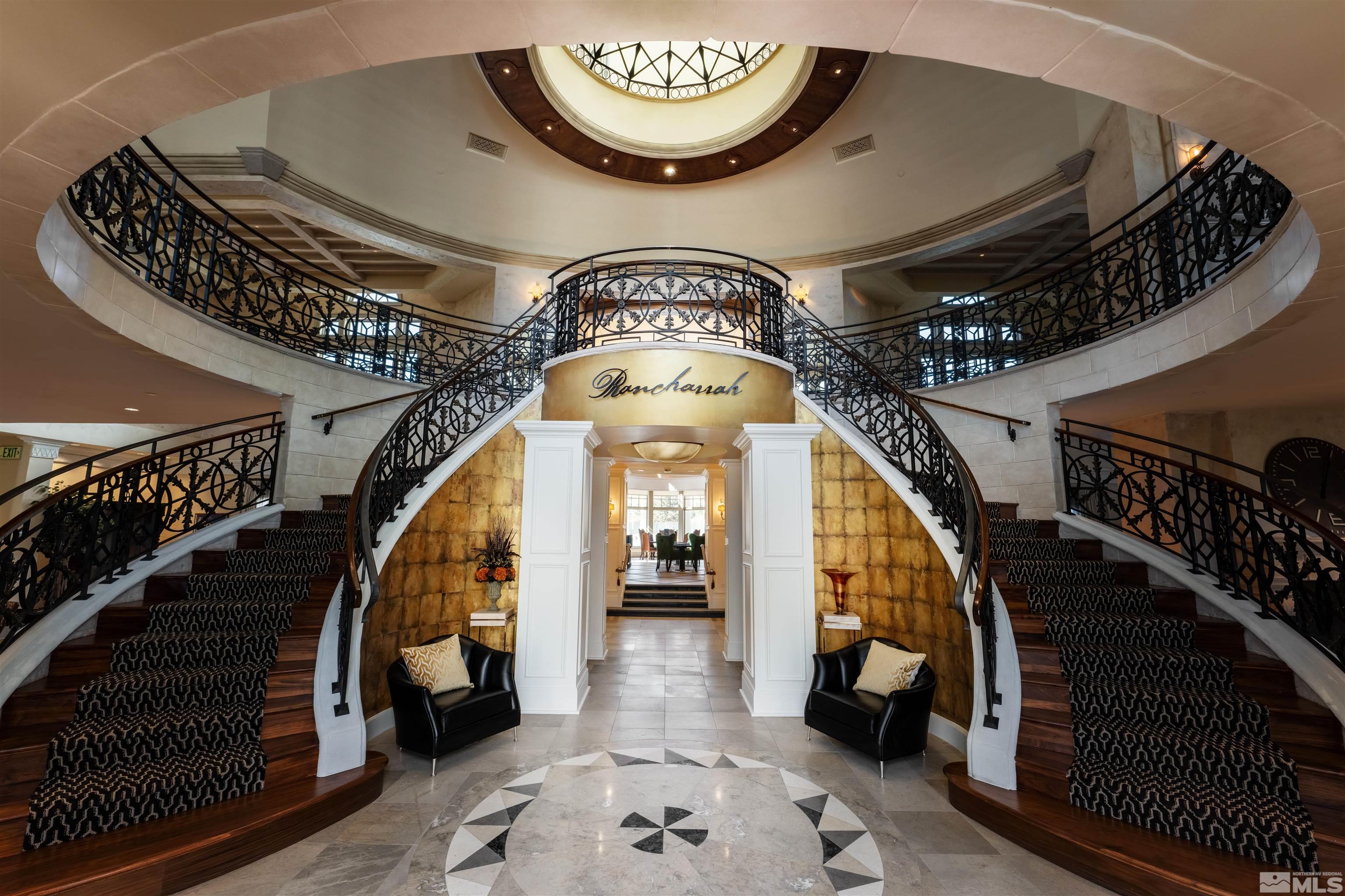 724 Canter Way Reno, NV 89511 - Photo 39 of 40 a view of entryway with a hallway and stairs