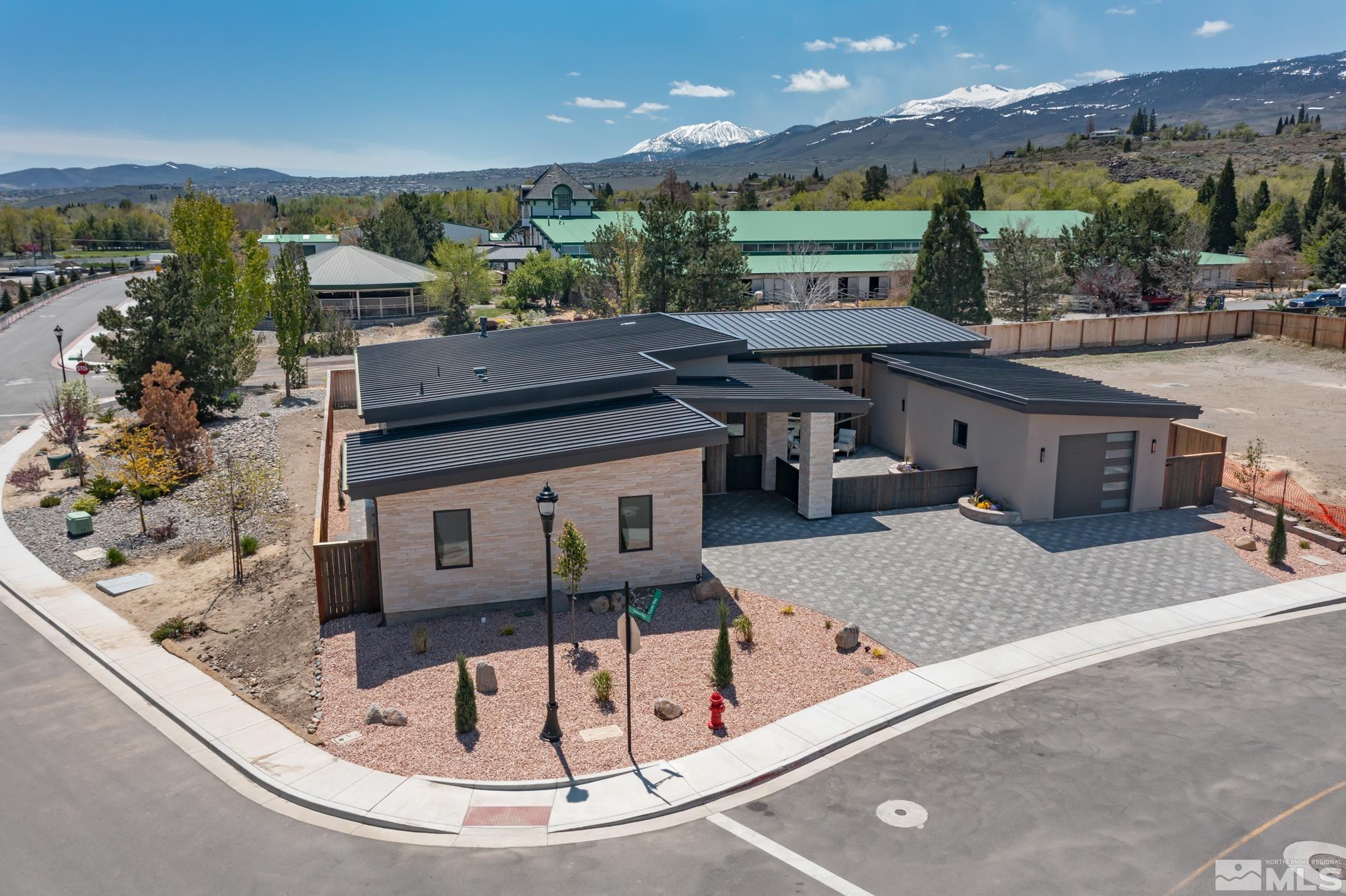 724 Canter Way Reno, NV 89511 - Photo 4 of 40 a view of a patio with a table and chairs