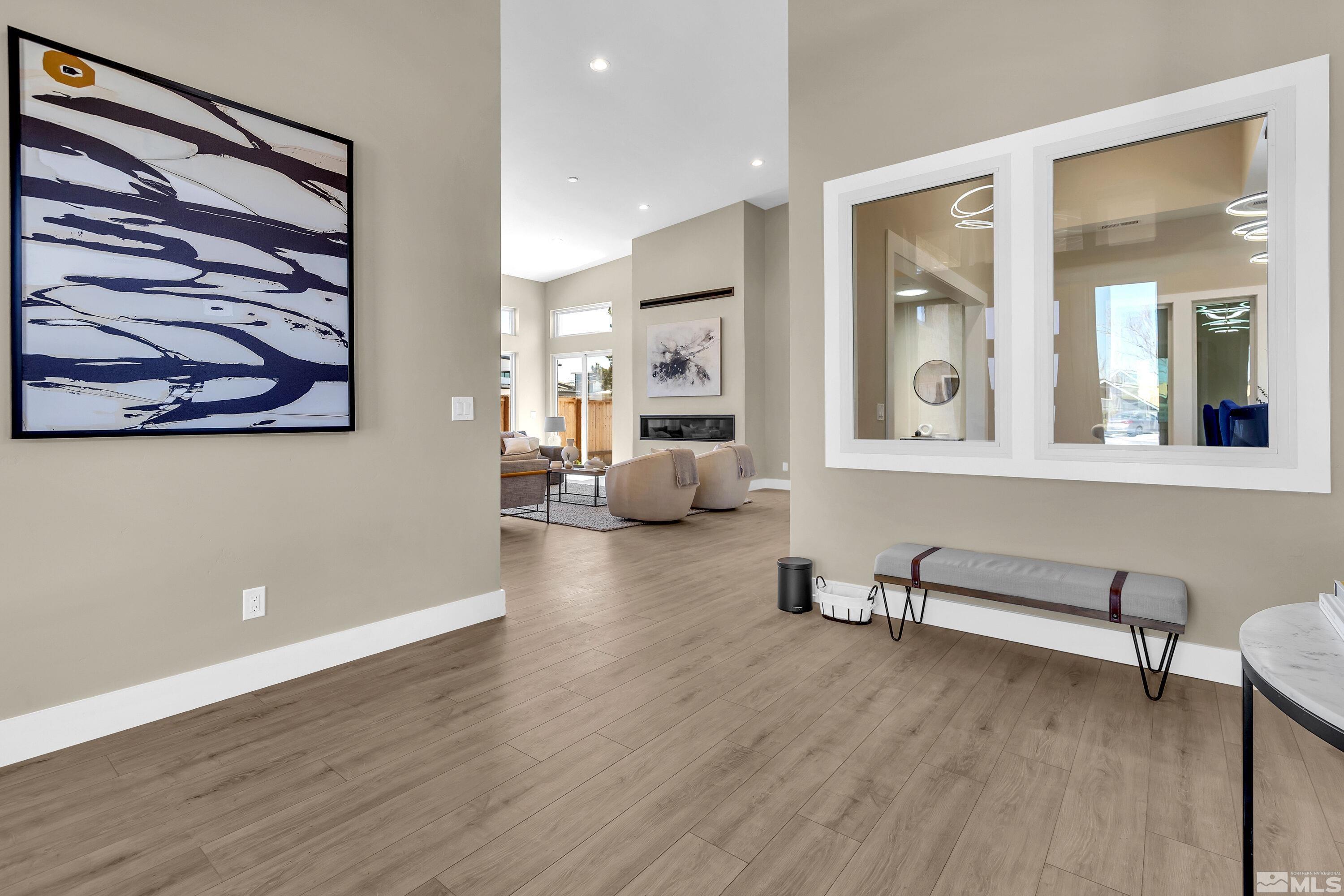 724 Canter Way Reno, NV 89511 - Photo 9 of 40 a view of a livingroom with furniture and windows