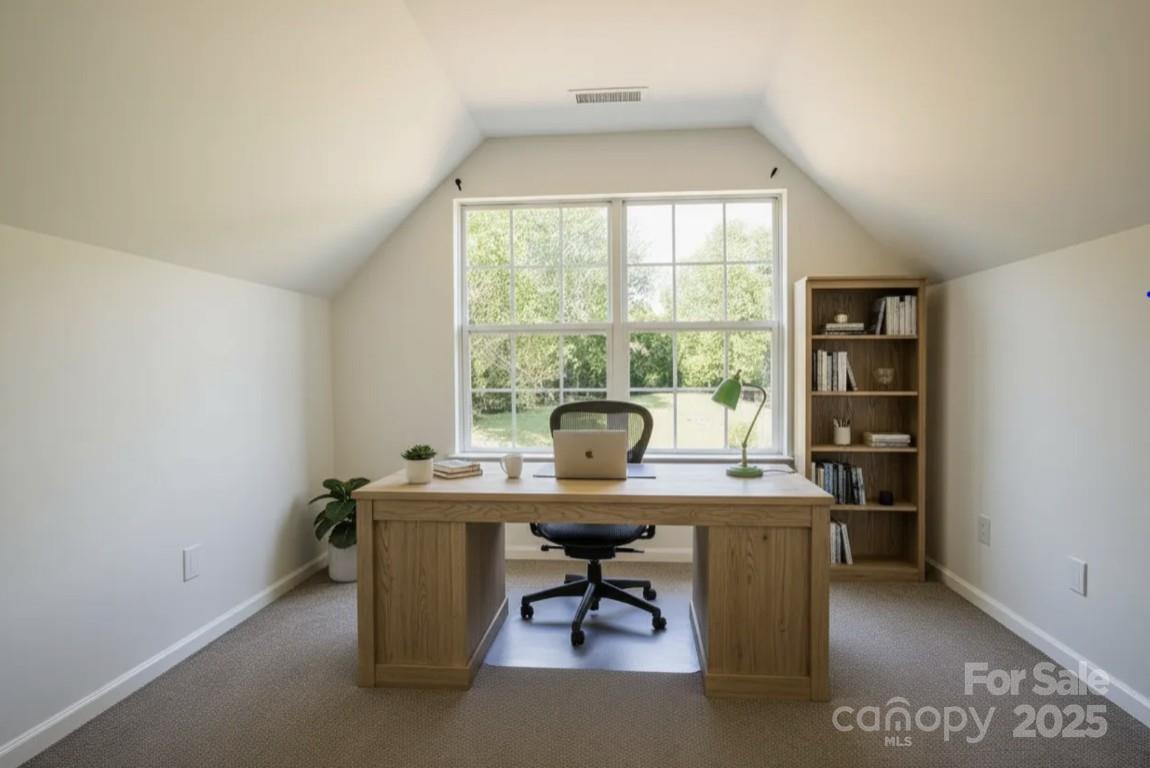2893 Signal Court Southwest Concord, NC 28025 - Photo 12 of 32 a view of a workspace with a window