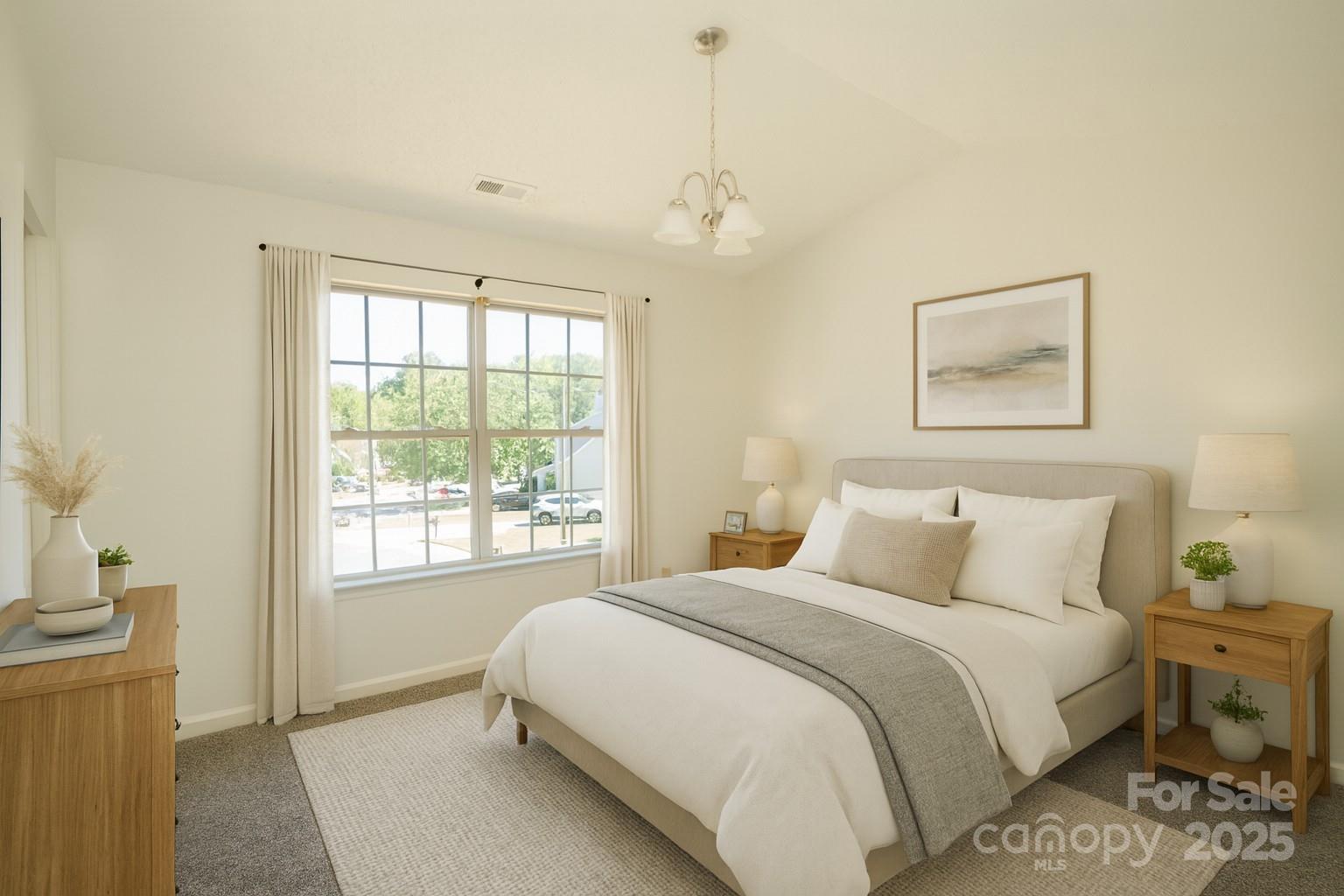 2893 Signal Court Southwest Concord, NC 28025 - Photo 15 of 32 a bedroom with a bed and a window