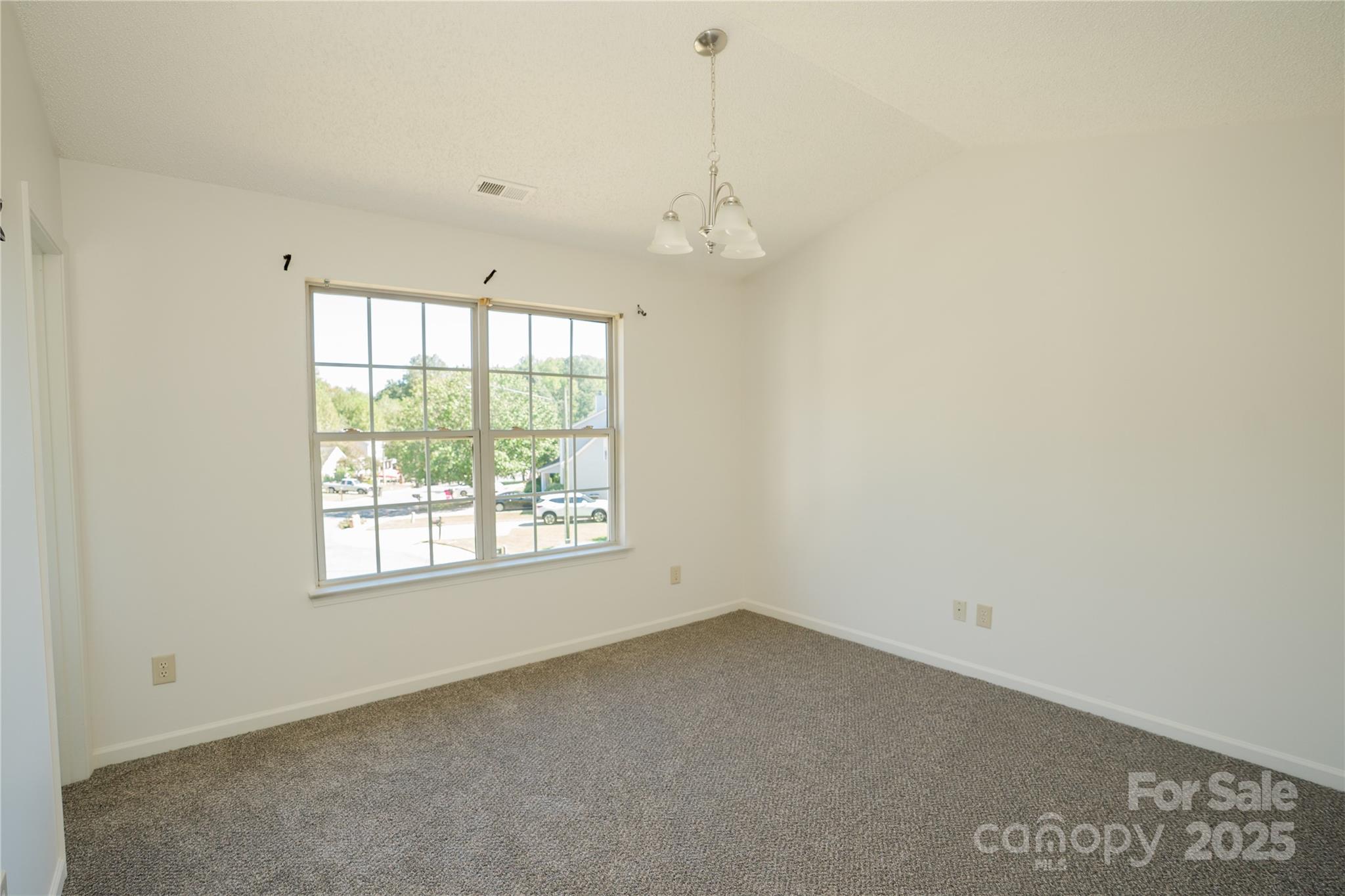 2893 Signal Court Southwest Concord, NC 28025 - Photo 16 of 32 an empty room with a window