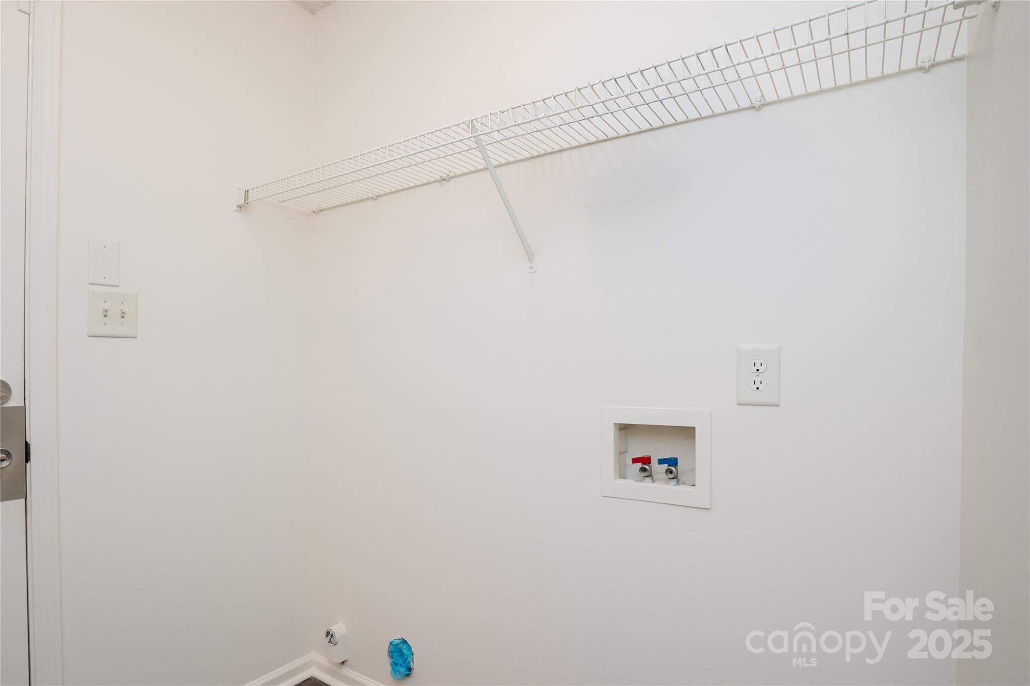 2893 Signal Court Southwest Concord, NC 28025 - Photo 10 of 32 a view of a wall with a fan