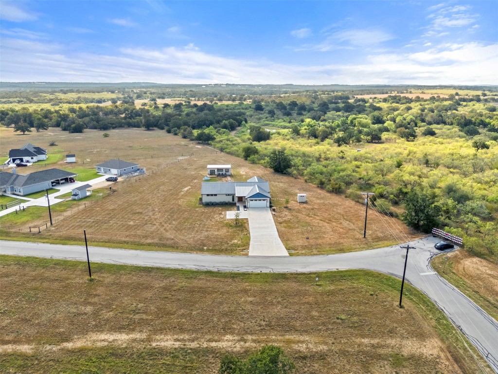 Ready for the perfect blend of modern living and country charm? This stunning 2024-built home in Blue Sky Estates offers all the sleek design you love with the peaceful escape you crave