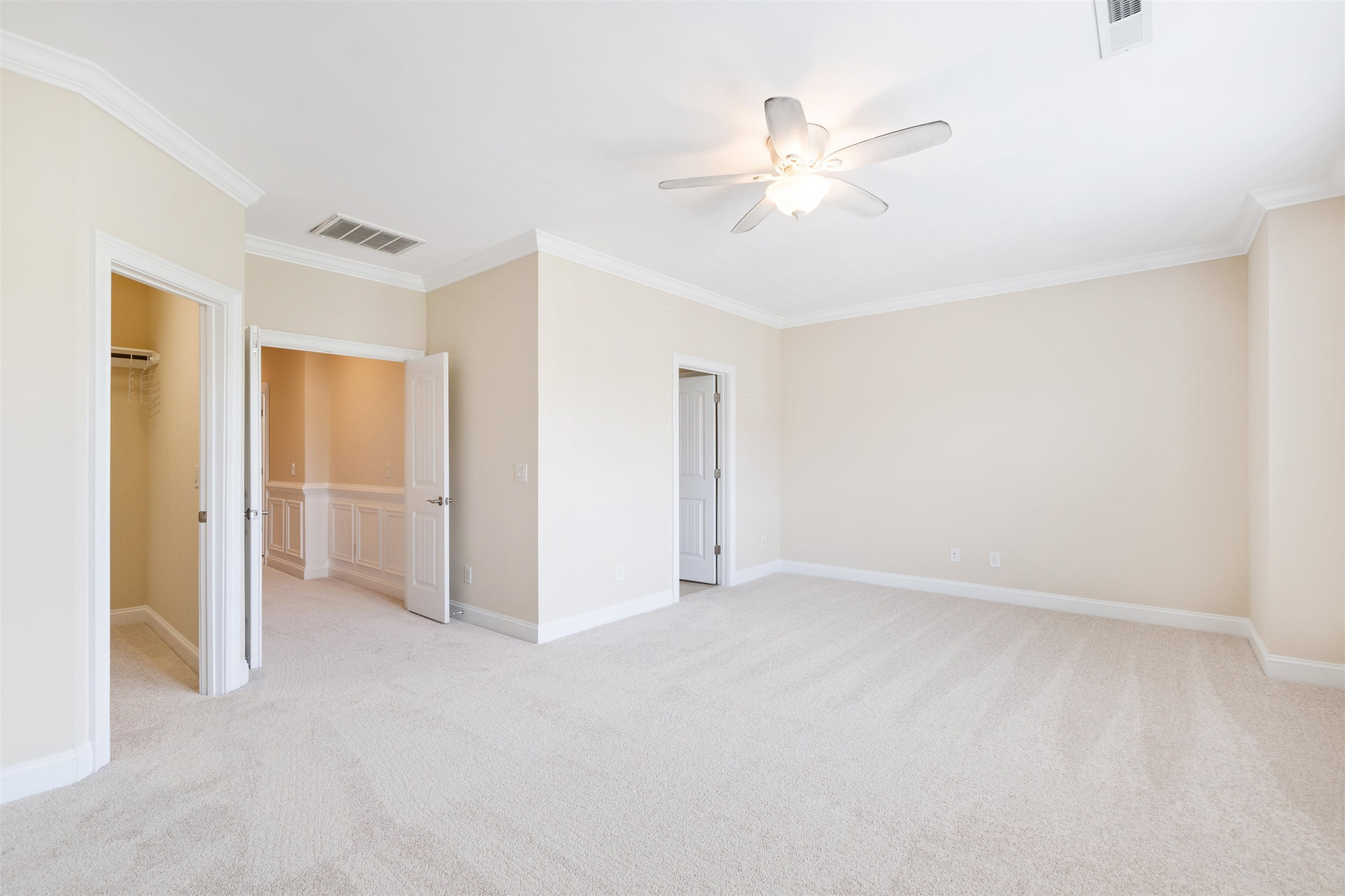 720 Fallon Grove Way Raleigh, NC 27608 - Photo 19 of 49 a view of an empty room and chandelier fan