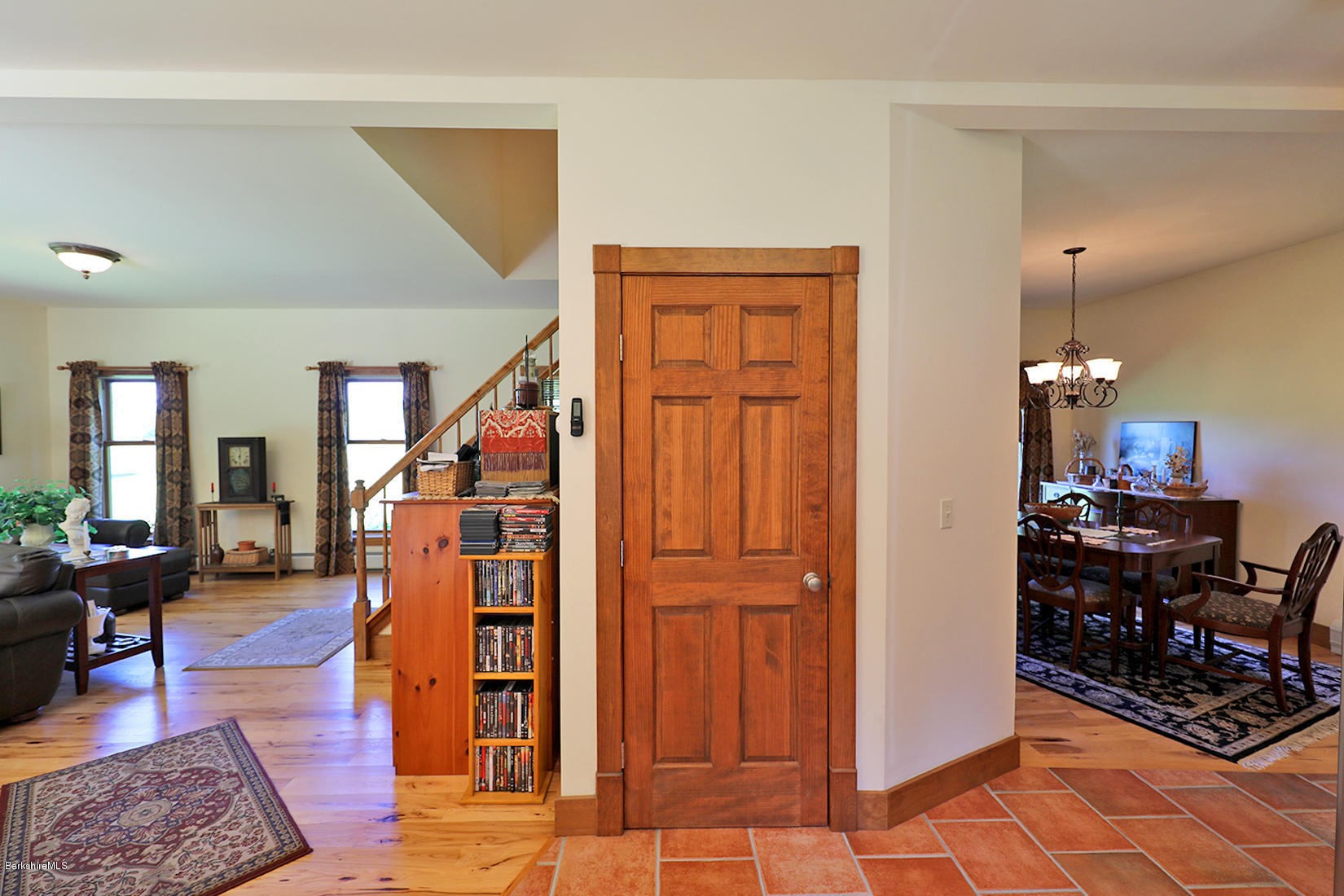 11 Stump Road Sandisfield, MA 01255 - Photo 12 of 41 a living room with furniture a dining table and chairs