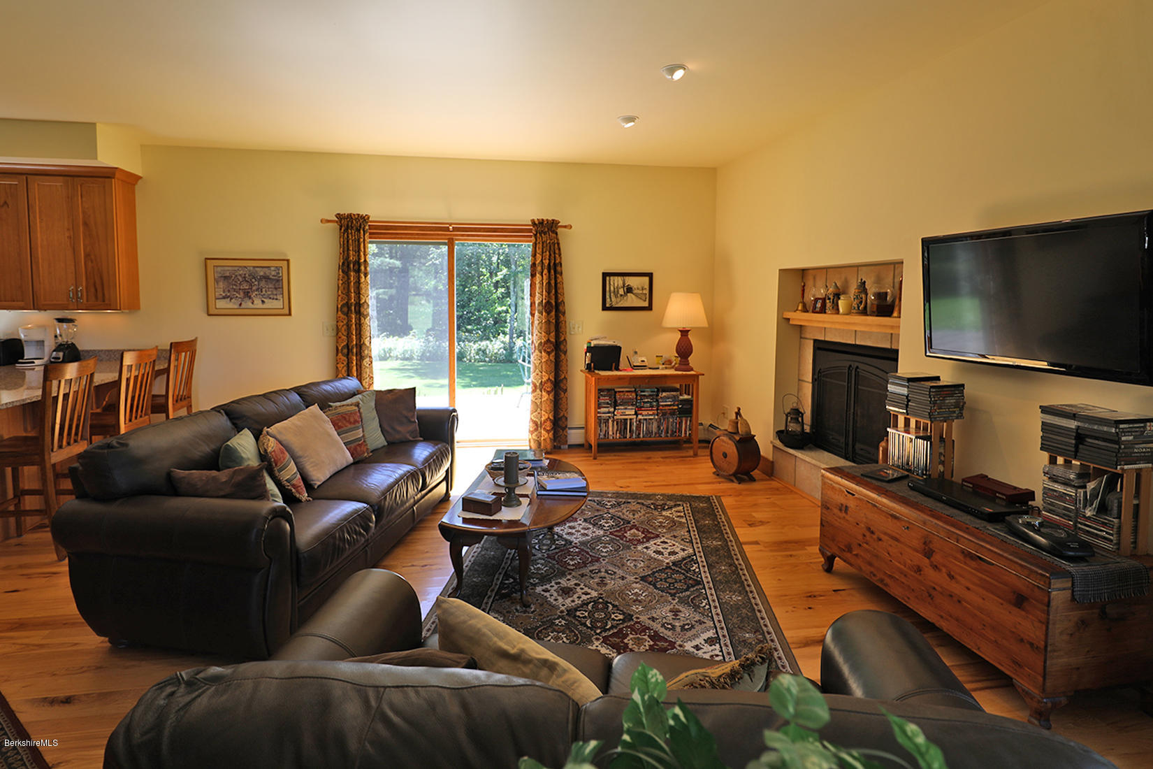 11 Stump Road Sandisfield, MA 01255 - Photo 15 of 41 a living room with furniture and a flat screen tv
