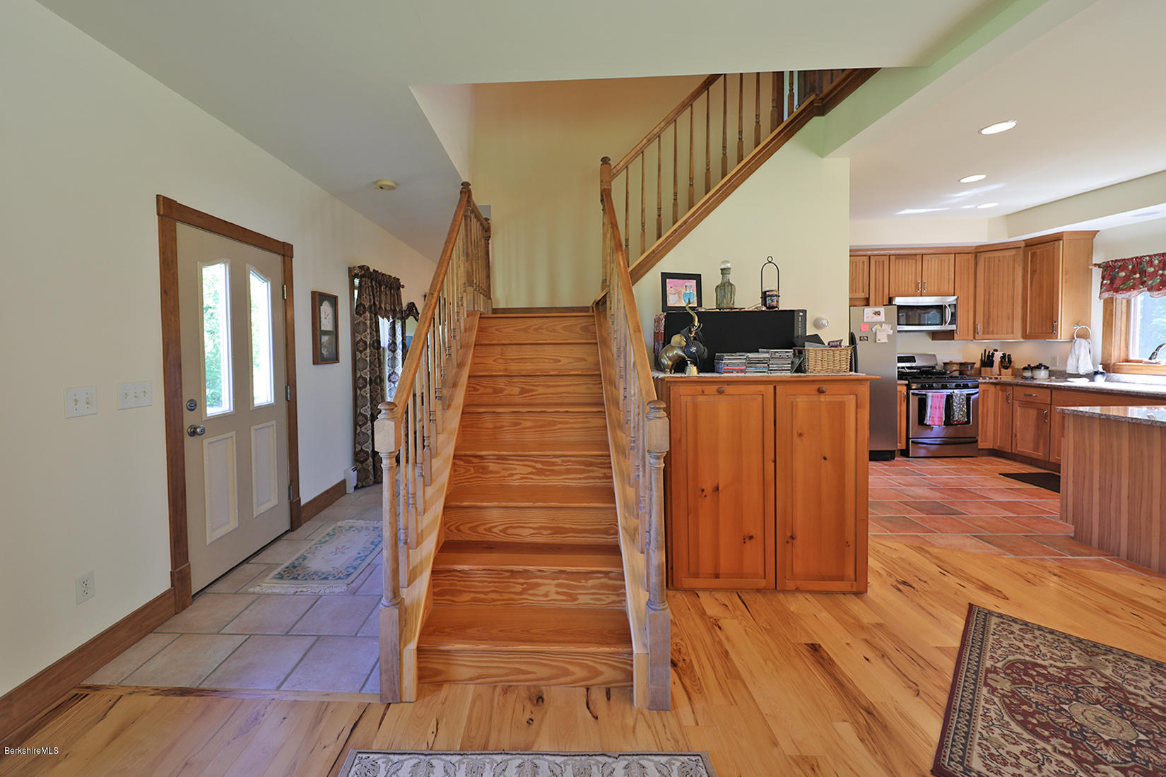 11 Stump Road Sandisfield, MA 01255 - Photo 17 of 41 a view of a living room with wooden floor and stairs