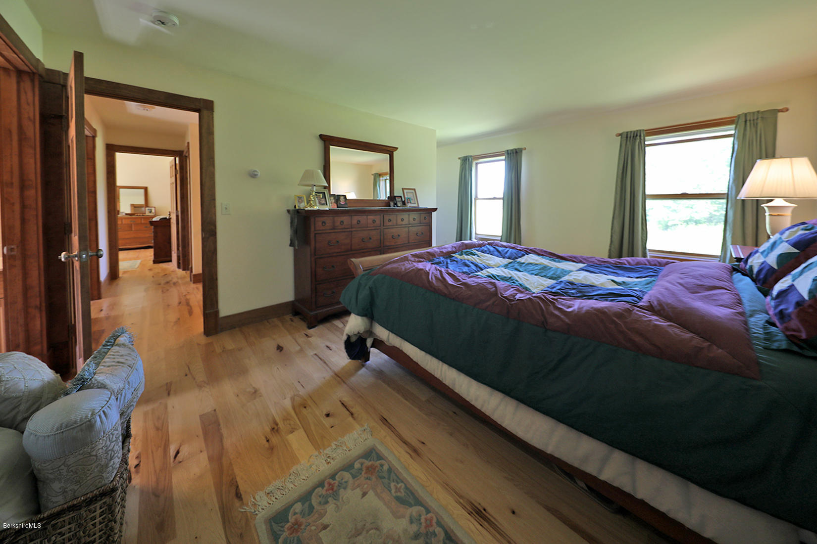11 Stump Road Sandisfield, MA 01255 - Photo 20 of 41 a bed sitting in a bedroom next to a window