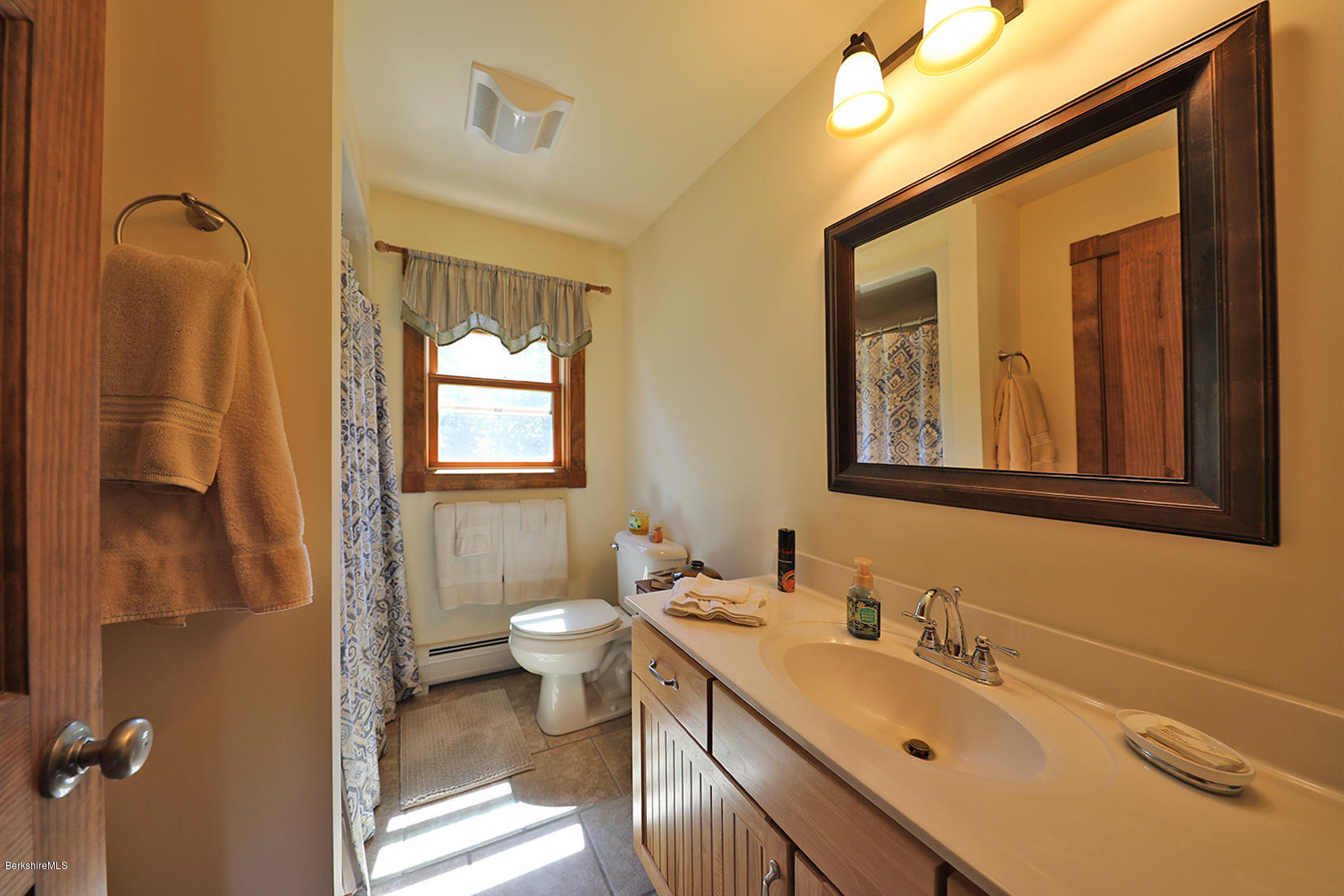 11 Stump Road Sandisfield, MA 01255 - Photo 21 of 41 a bathroom with a sink and a mirror