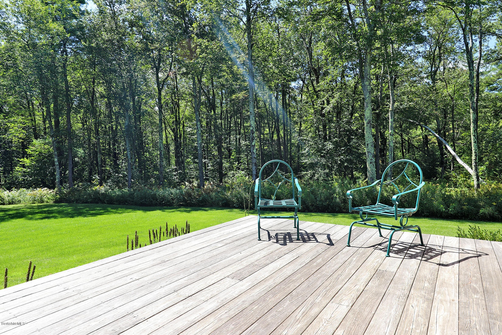 11 Stump Road Sandisfield, MA 01255 - Photo 28 of 41 a park view with a table and chairs