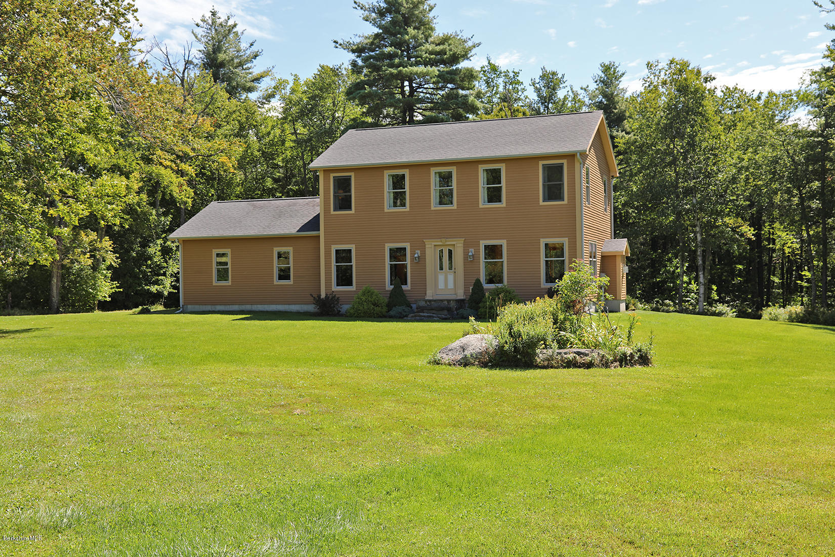 11 Stump Road Sandisfield, MA 01255 - Photo 32 of 41 a front view of a house with a garden