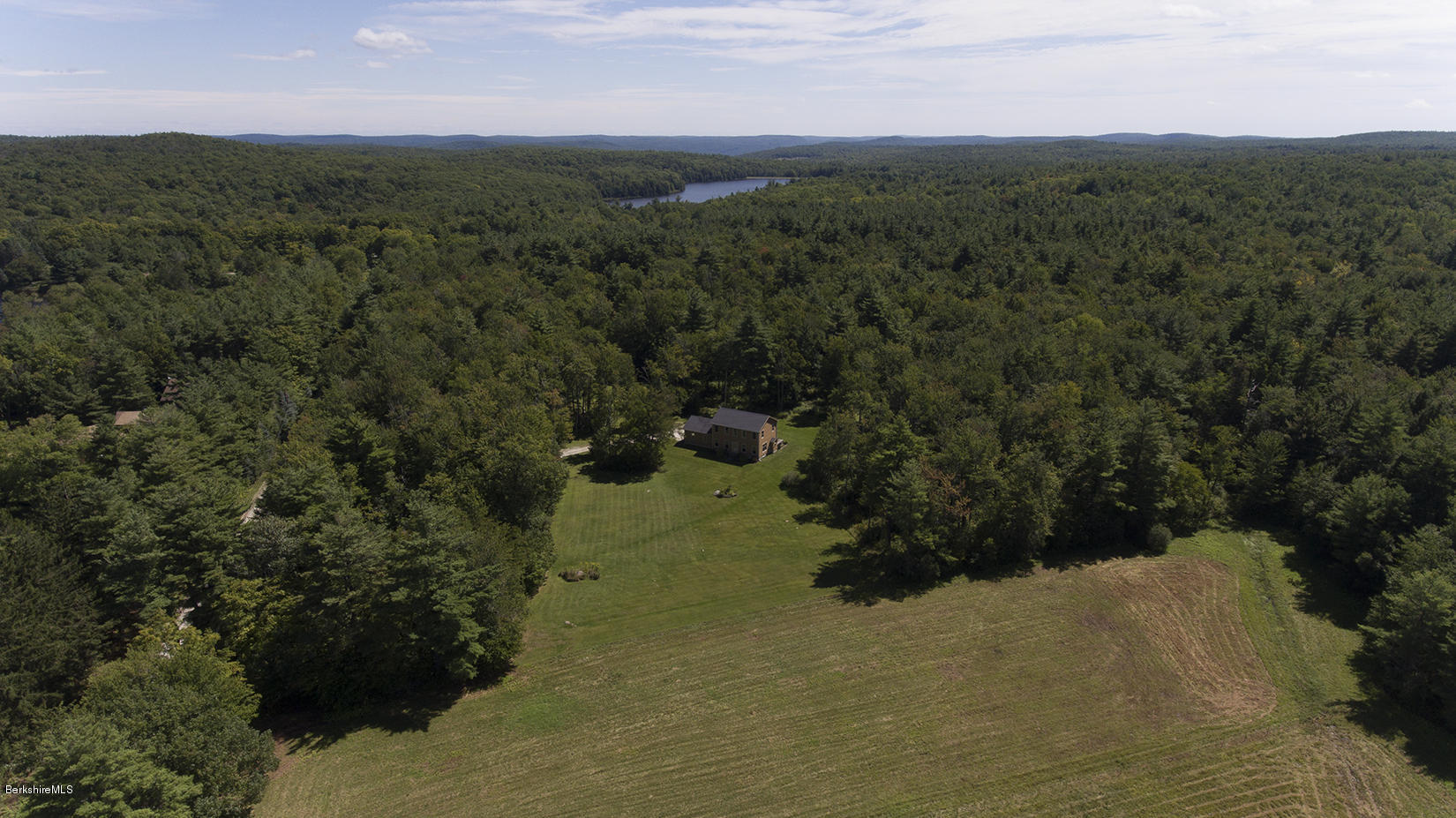 11 Stump Road Sandisfield, MA 01255 - Photo 36 of 41 a view of a field with a yard