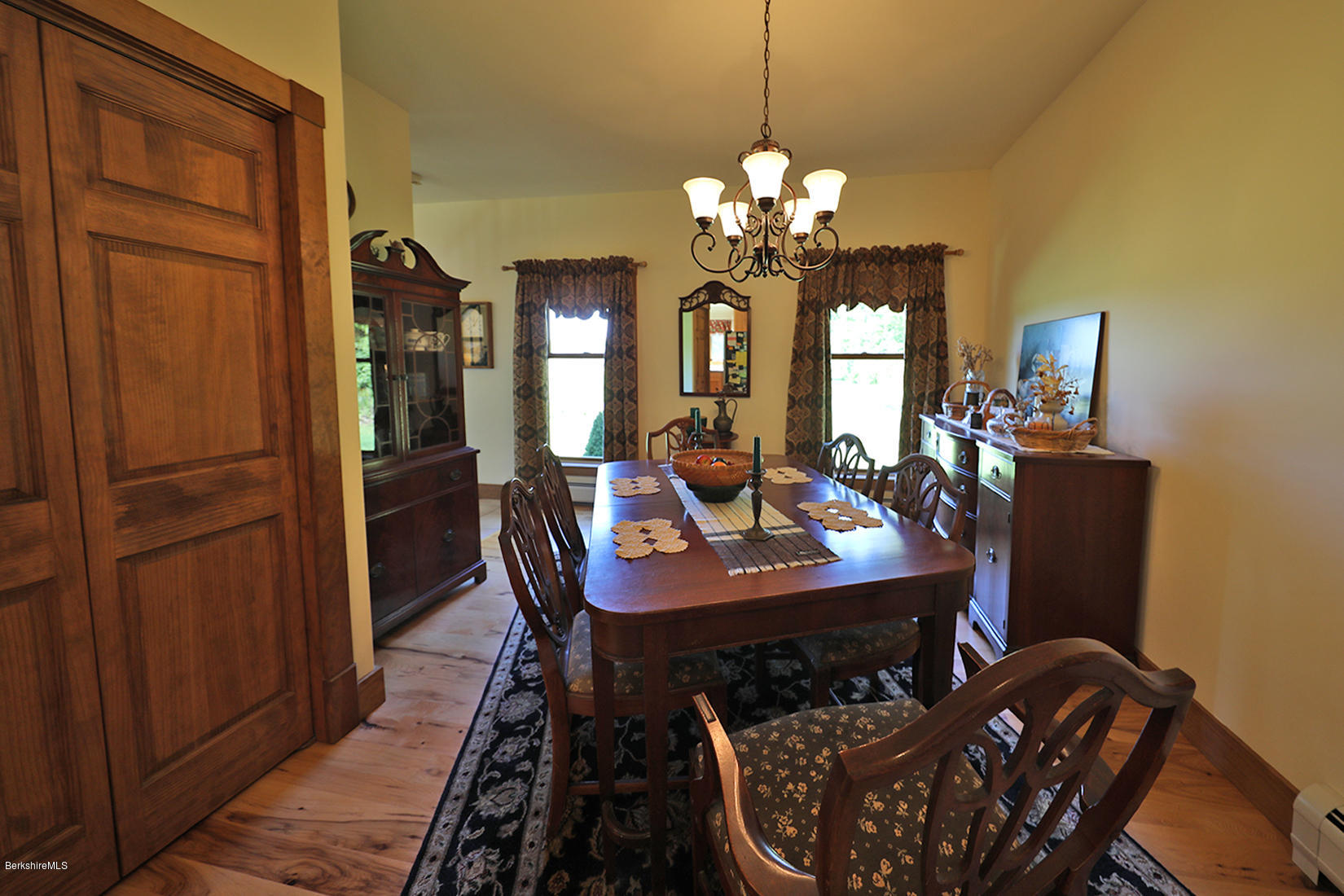 11 Stump Road Sandisfield, MA 01255 - Photo 9 of 41 a view of a dining room with furniture and chandelier